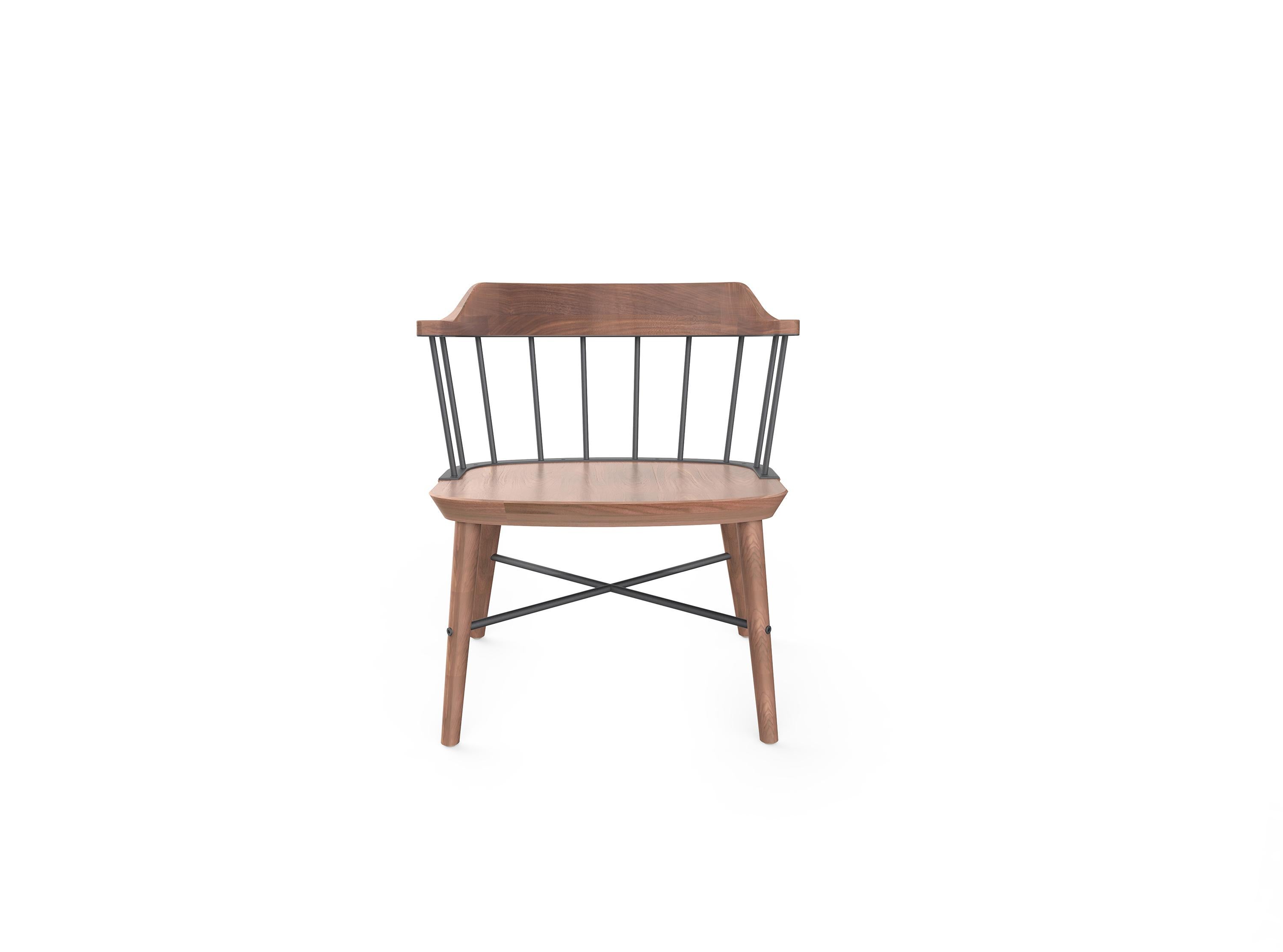 The Exchange chair is an award-winning contemporary wood and steel chair inspired by the traditional Windsor form.

By exchanging the conventional wooden spindles and stretcher of the Windsor back with steel, Crème has produced a new chair that