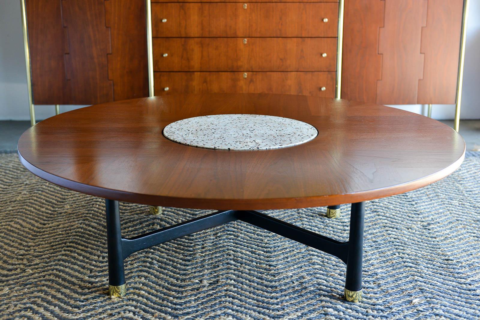 Walnut and terrazzo coffee table by Harvey Probber, circa 1960. Professionally restored with walnut top, original terrazzo inset and ebonized base with polished brass feet. Gorgeous design, one of his classics and most popular. Very functional and