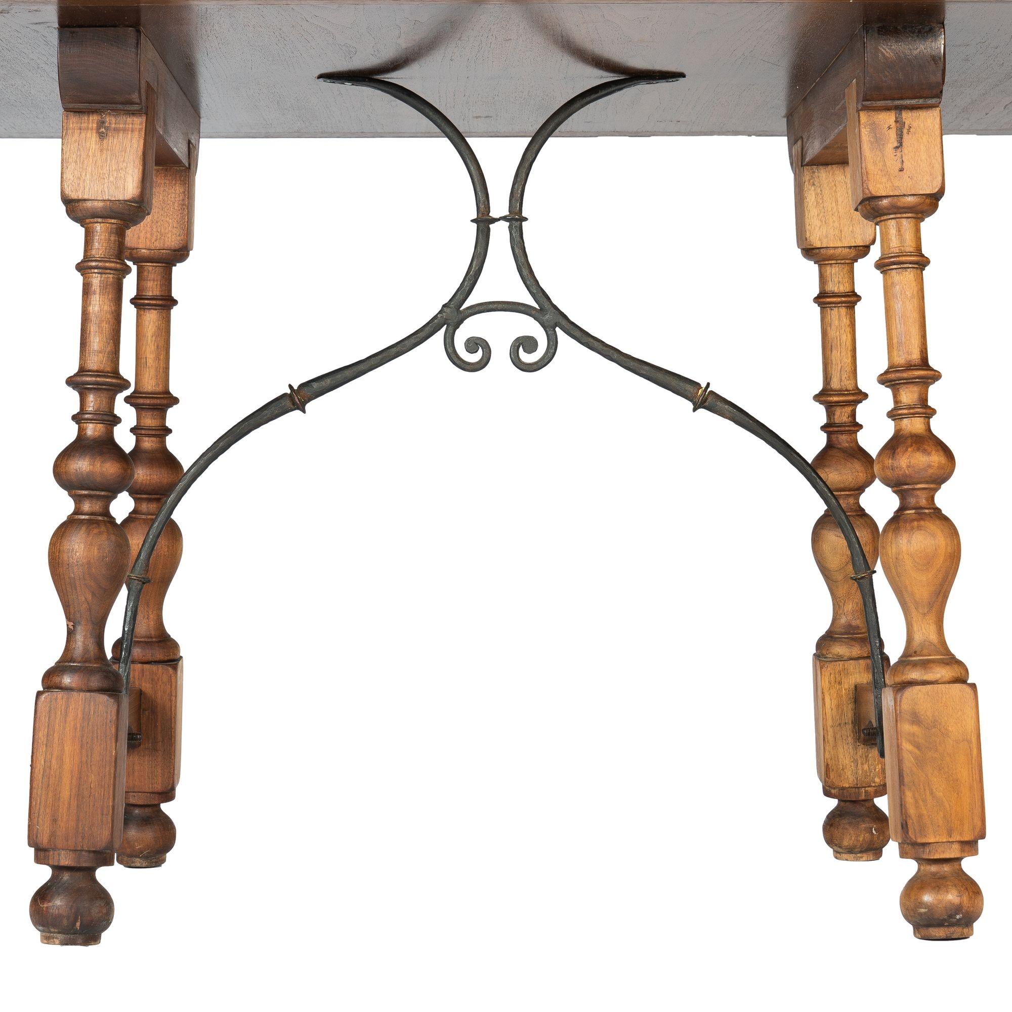 Walnut and travertine marble top table in the Spanish Baroque taste, 1925 For Sale 1