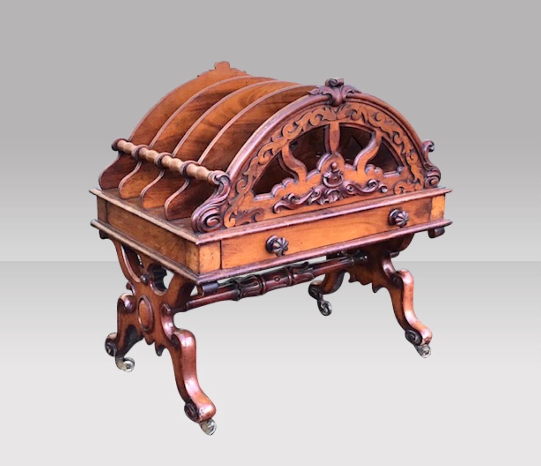 
Decorative Carved Victorian Antique  Walnut Canterbury Magazine Rack,the three oval shape divisions over a base fitted with a drawer on ceramic castor supports 
Circa 1870

23ins x 23ins x 18ins