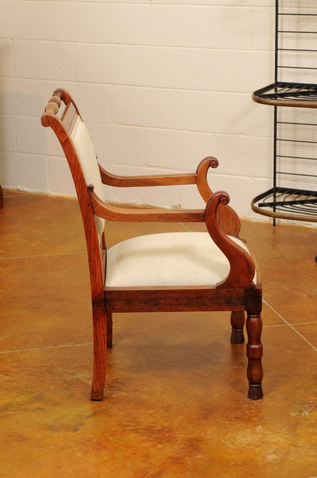 Upholstery Walnut Armchair with Turned Rail & Legs and Scroll Arms, France, circa 1840 For Sale