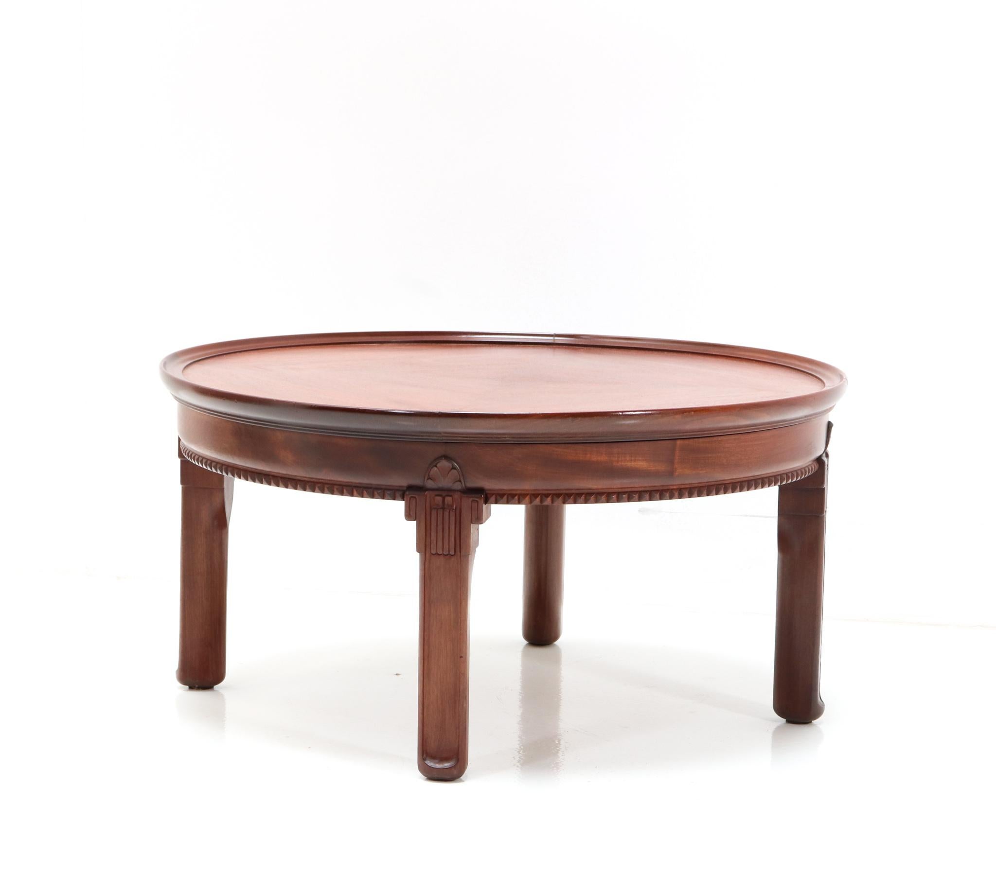 Magnificent and rare Art Deco Amsterdamse School coffee table.
Striking Dutch design from the 1920s.
Solid walnut base with original walnut veneered top.
This wonderful Art Deco Amsterdamse School coffee table is in very good refinished condition