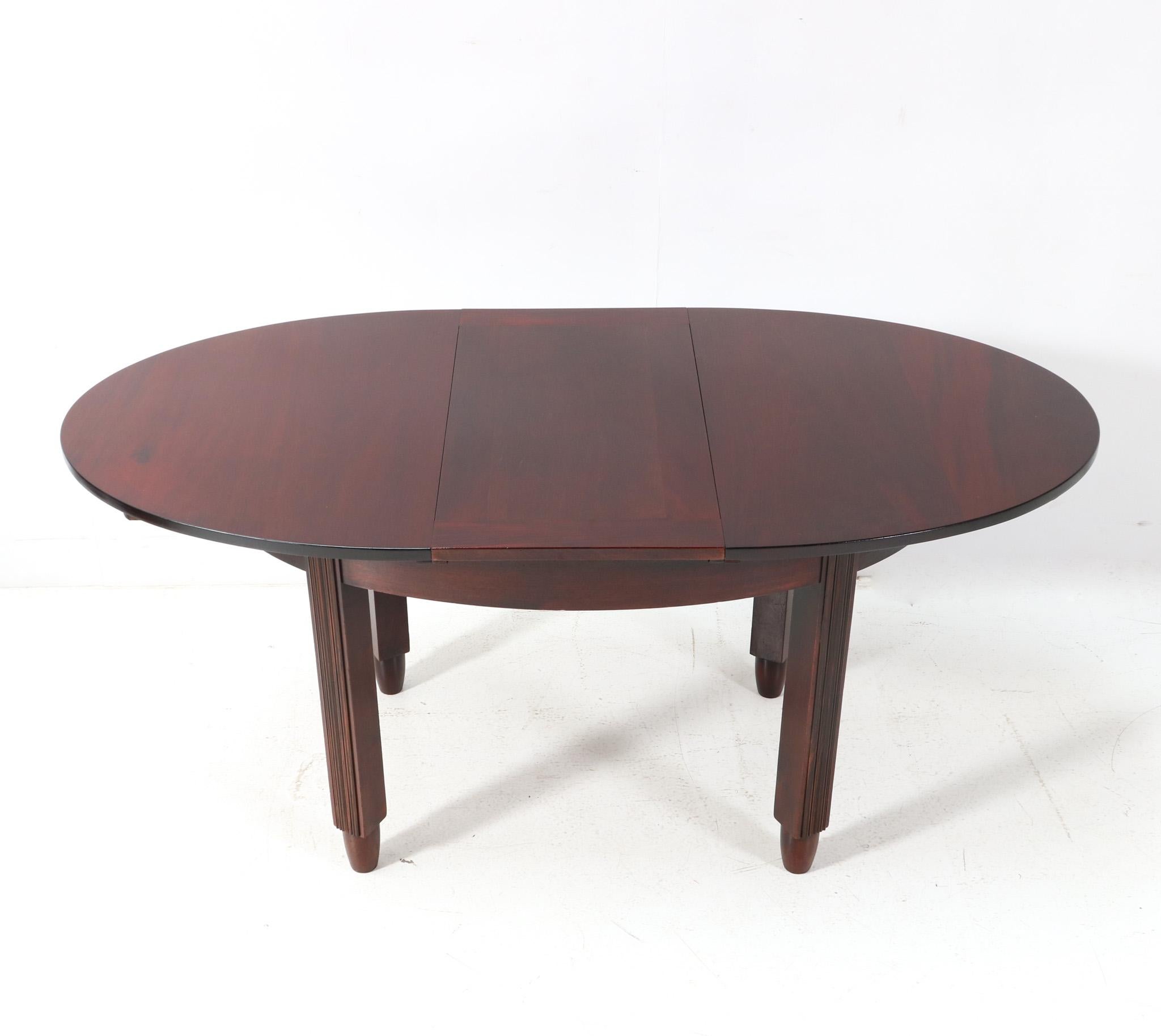 Early 20th Century Walnut Art Deco Amsterdamse School Extendable Dining Room Table by Fa. Drilling For Sale