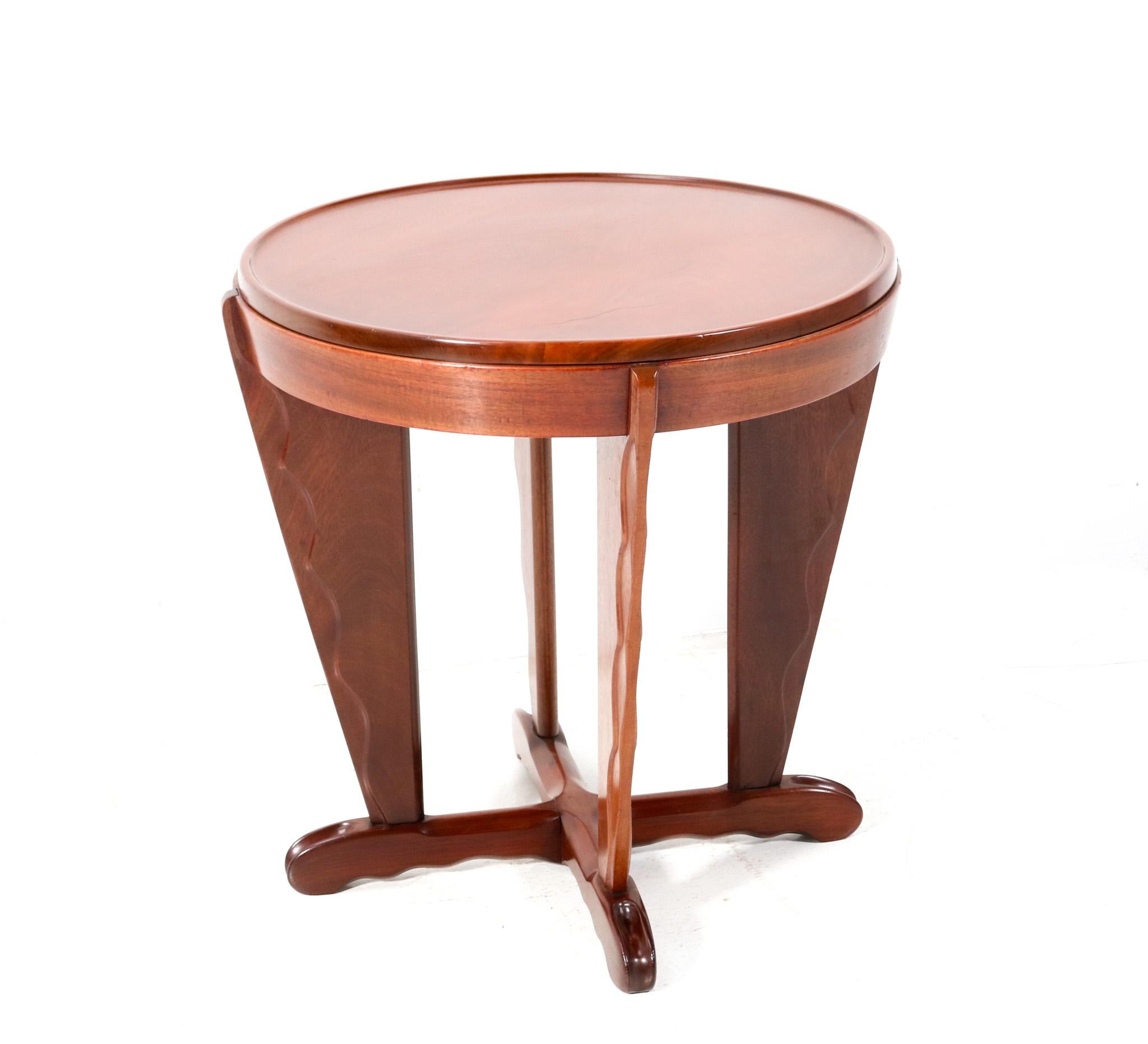 Magnificent and rare Art Deco Amsterdamse School side table.
Design by A.F. van der Weij.
Striking Dutch design from the 1920s.
Solid walnut base with four elegant and stylish feet.
This wonderful Art Deco Amsterdamse School side table by A.F. van