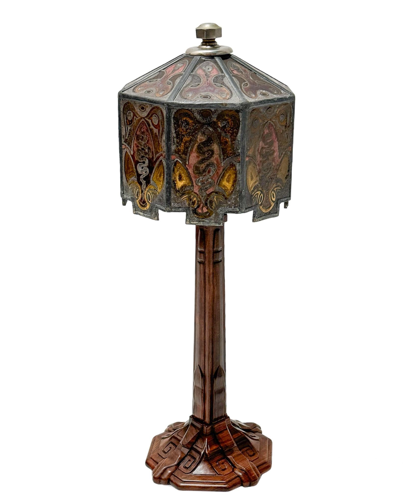 Magnificent and rare Art Deco Amsterdamse School table lamp.
Design by Napoleon Le Grand for Modelhuis Legrand Amsterdam.
Striking Dutch design from the 1920s.
Stylish solid walnut base with decorative stained glass shade.
Rewired with three small