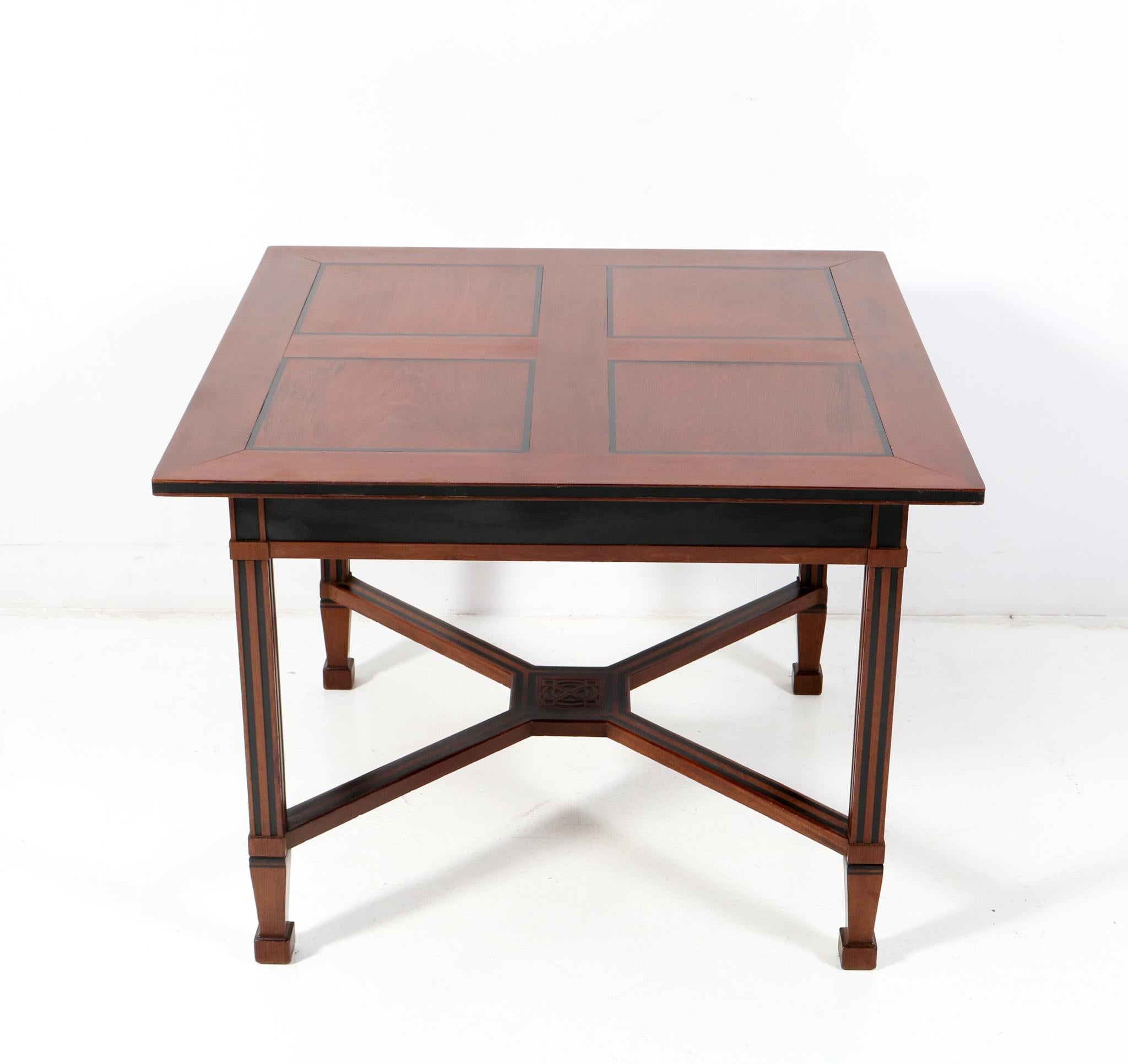 Amazing and rare Art Nouveau Arts & Crafts table or writing table.
Design by K.P.C. de Bazel.
Striking Dutch design from the 1900s.
Solid walnut base with original walnut and black lacquer top.
This wonderful Art Nouveau Arts & Crafts table or
