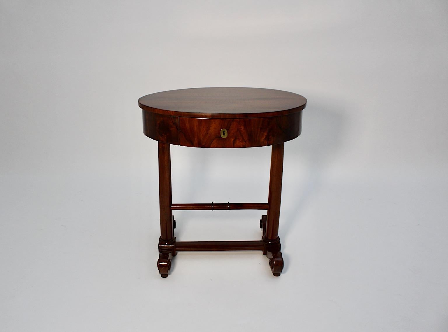 Austrian Walnut Biedermeier Oval Side Table Sewing Table circa 1825 Vienna For Sale