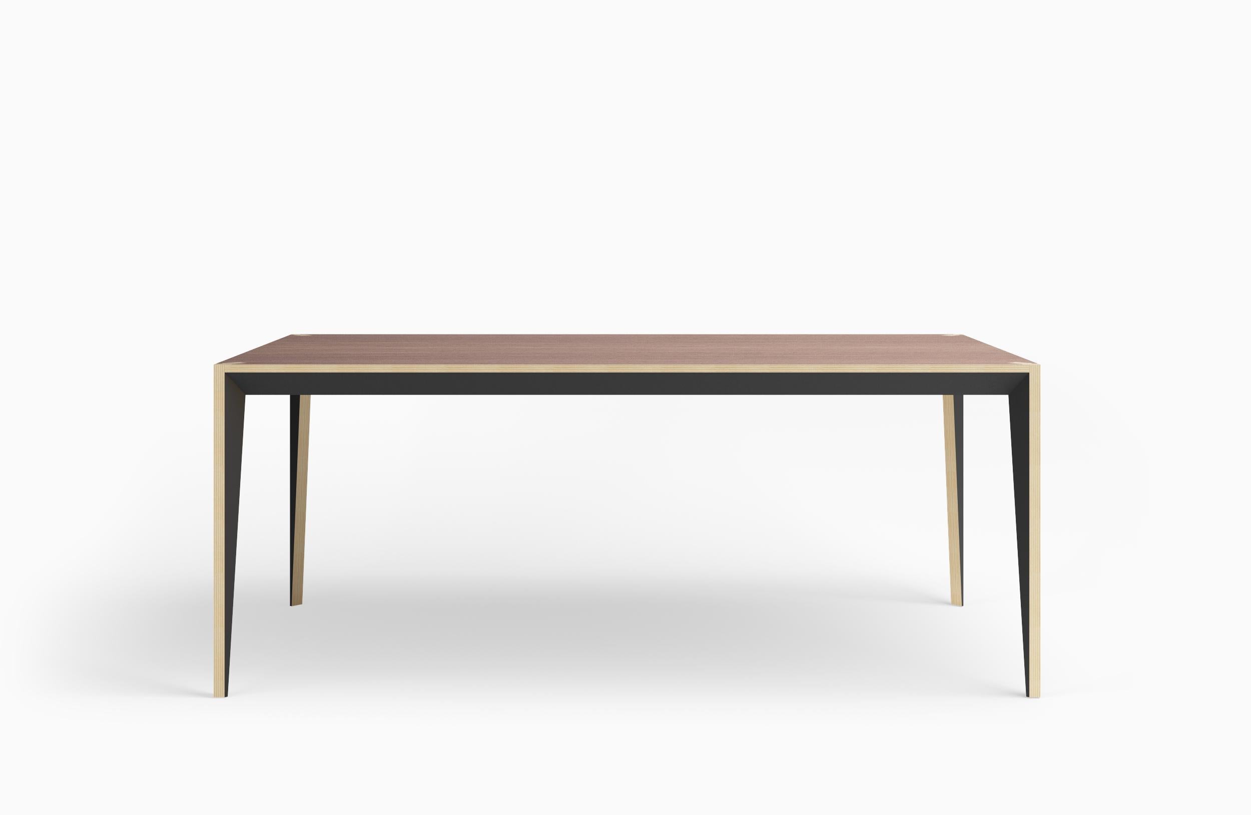 Merging clean lines with warm materials, the faceted geometry of the MiMi dining table creates a slender, elegant profile punctuated with painted surfaces that capture light. This modern and graceful dining table looks great from all angles making