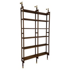 Libreria in noce con ferramenta in ottone