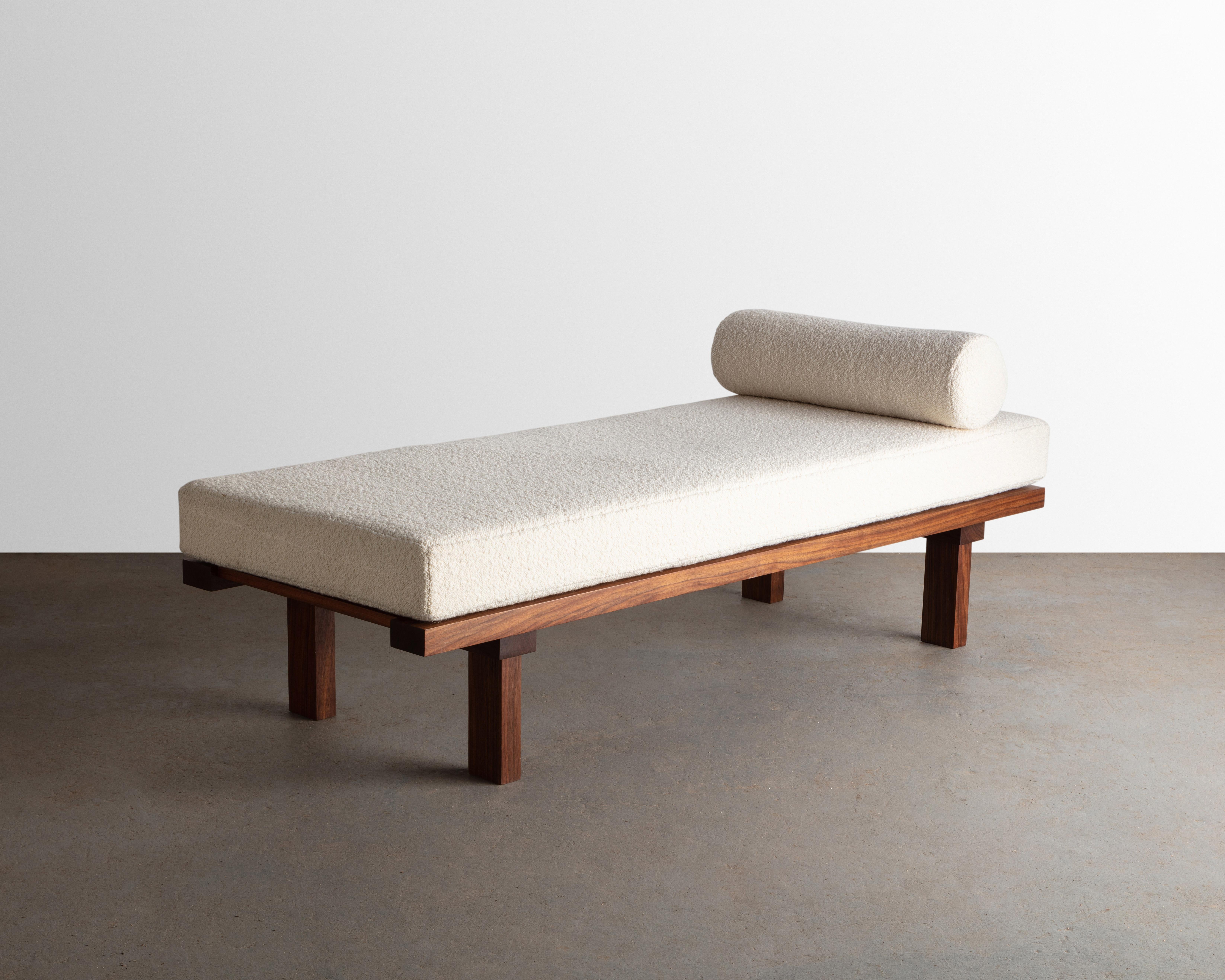Constructed from solid walnut this Japanese jointed Daybed is designed and built to last. Its mattresses and bolster are upholstered with a natural Bouclé fabric.

We also offer COM on all work. 

Send us your own fabric and we will upholster the