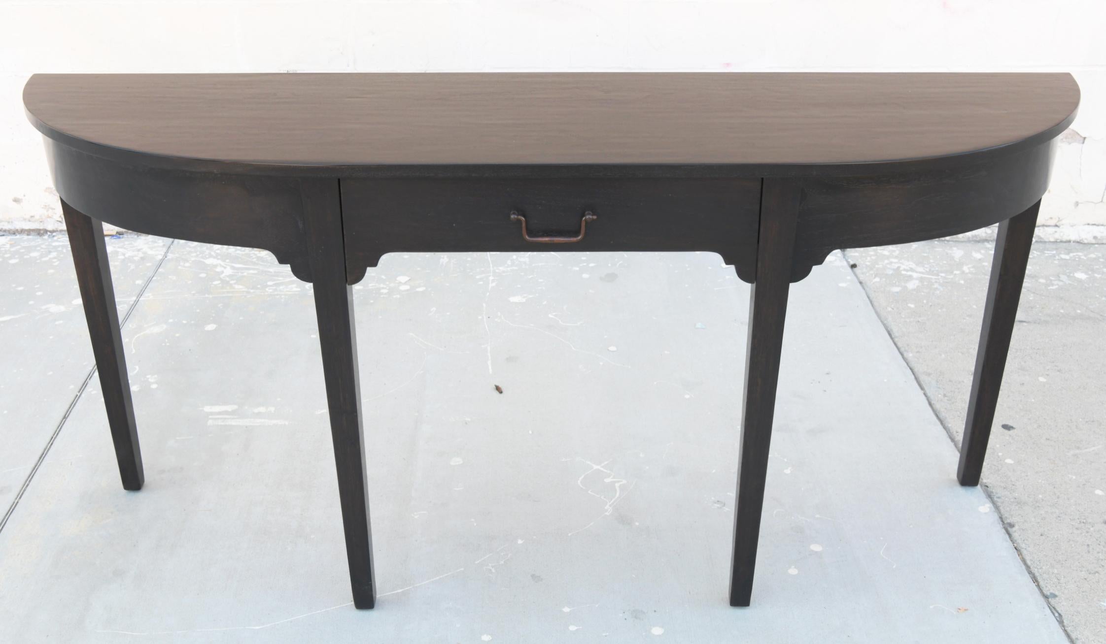 This distressed walnut table is seen here in H 34 in. x W 72.5 in. x D 20 in, however it can be built in any size.

Because each table is bench-made in our own Los Angeles workshop you can influence all aspects of design, including size, wood