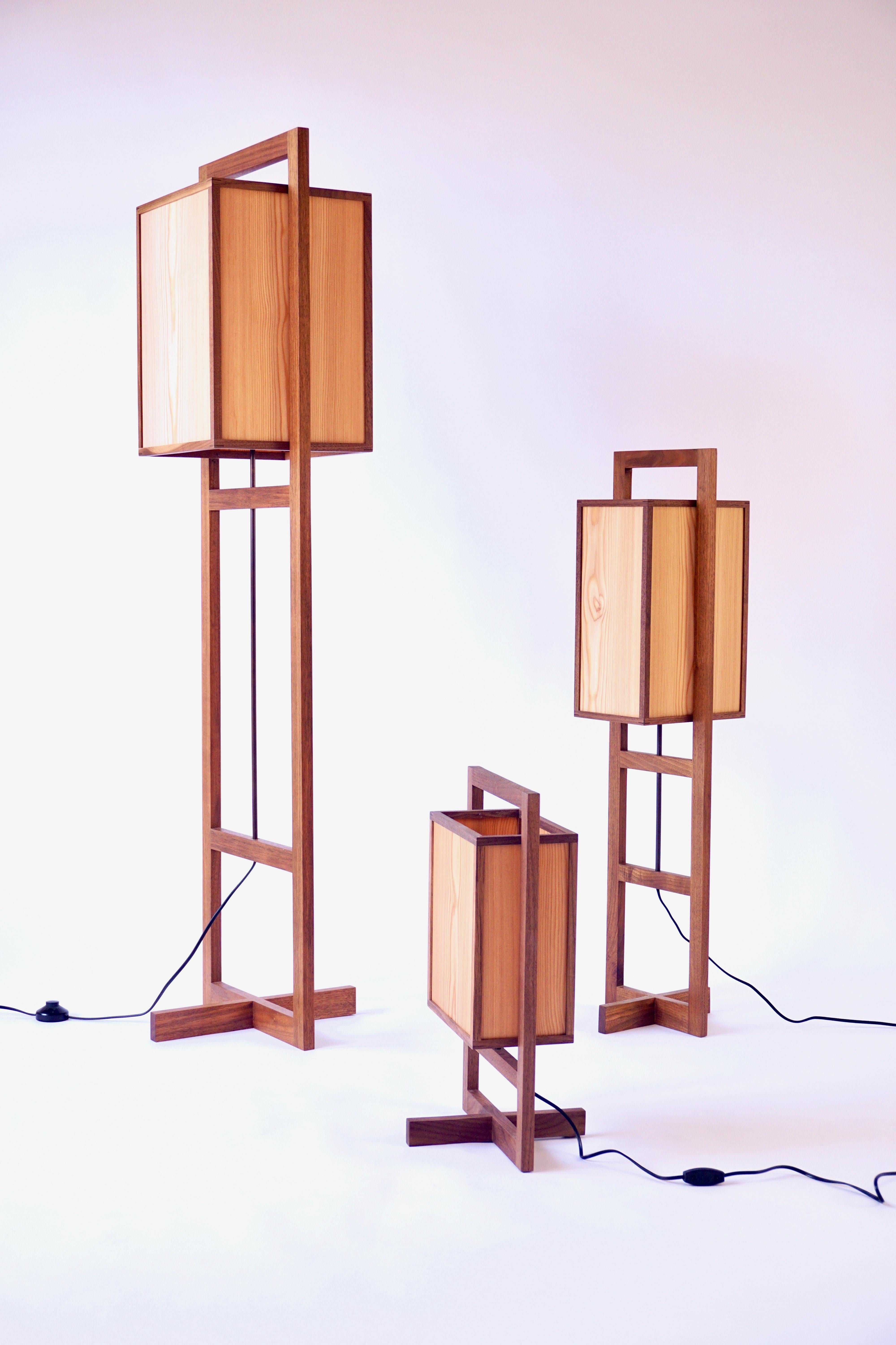 The medium box lamp is one of a group of lamps designed by Chris Lehrecke in 2008. They were influenced by Japanese lanterns, as well as early Frank Lloyd Wright Designs. The lamps are beautifully crafted in Lehrecke's own studio with larch veneers