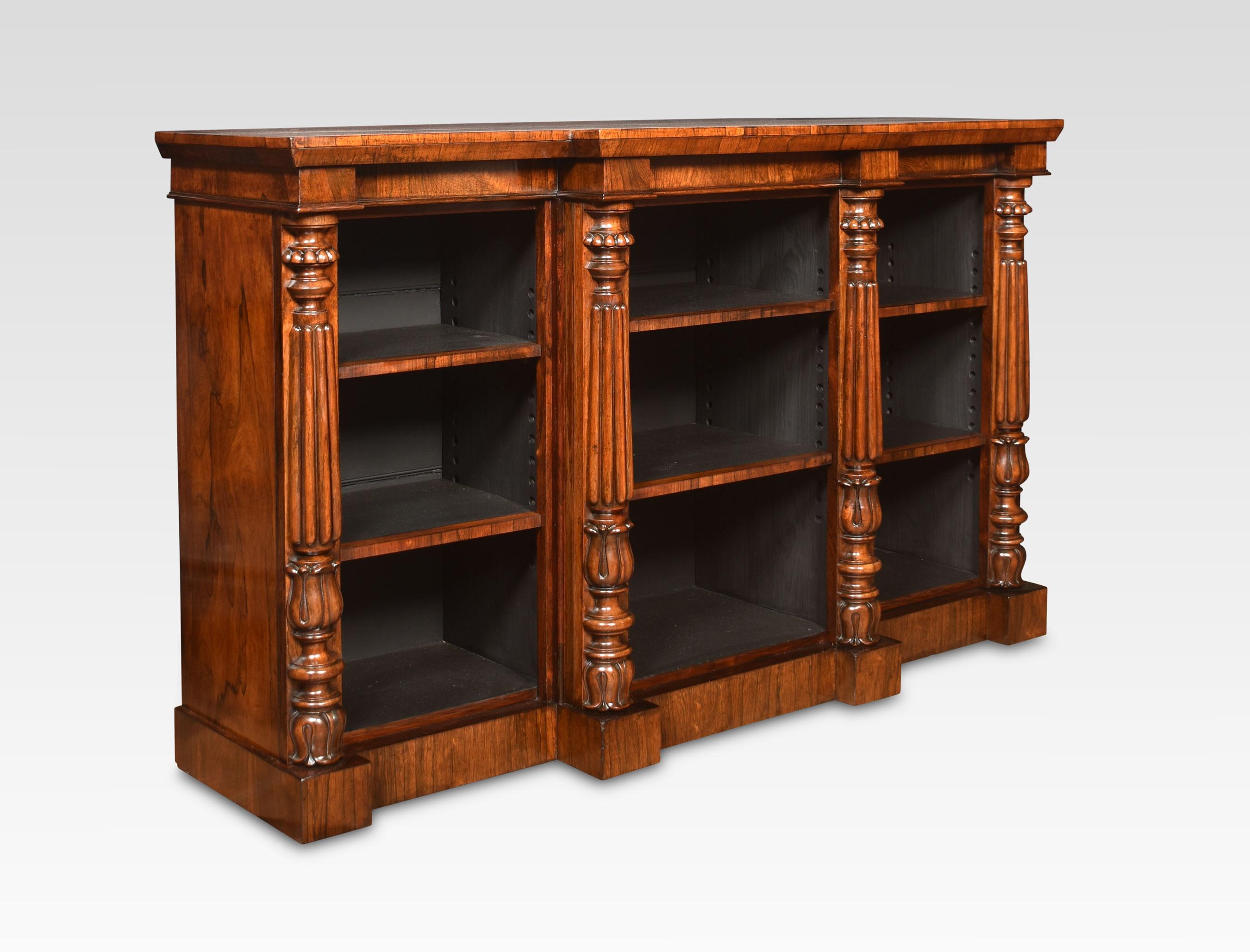 Open bookcase, the large rectangular breakfront top above three bays of adjustable shelves, divided by turned reeded column pilasters. All raised up on a plinth base.
Dimensions
Height 38 Inches
Width 63.5 Inches
Depth 18 Inches.