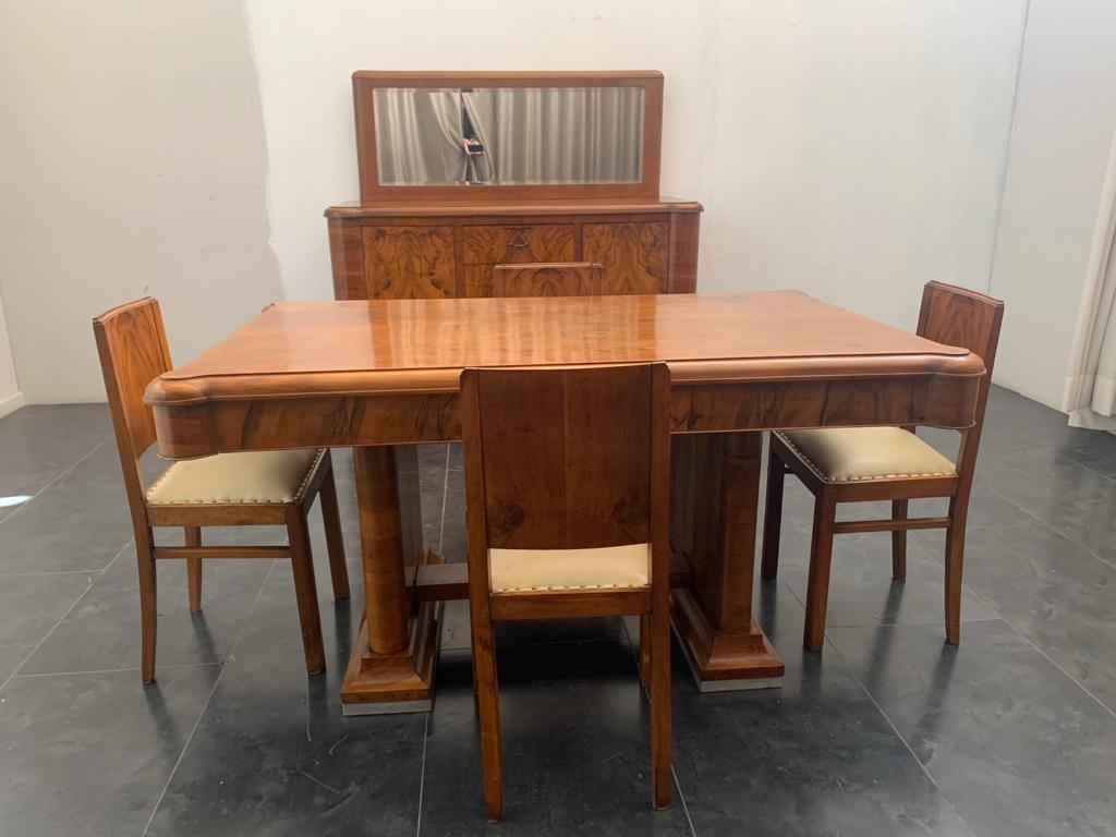 Beautiful Italian dining room set from the 1940s composed by dining table -H83X100x163, sideboard with mirror - h100x170x55 + mirror h60x146, in rosewood and briar. 4 Chairs H88x45xp43
Packaging with bubble wrap and cardboard boxes is included. If