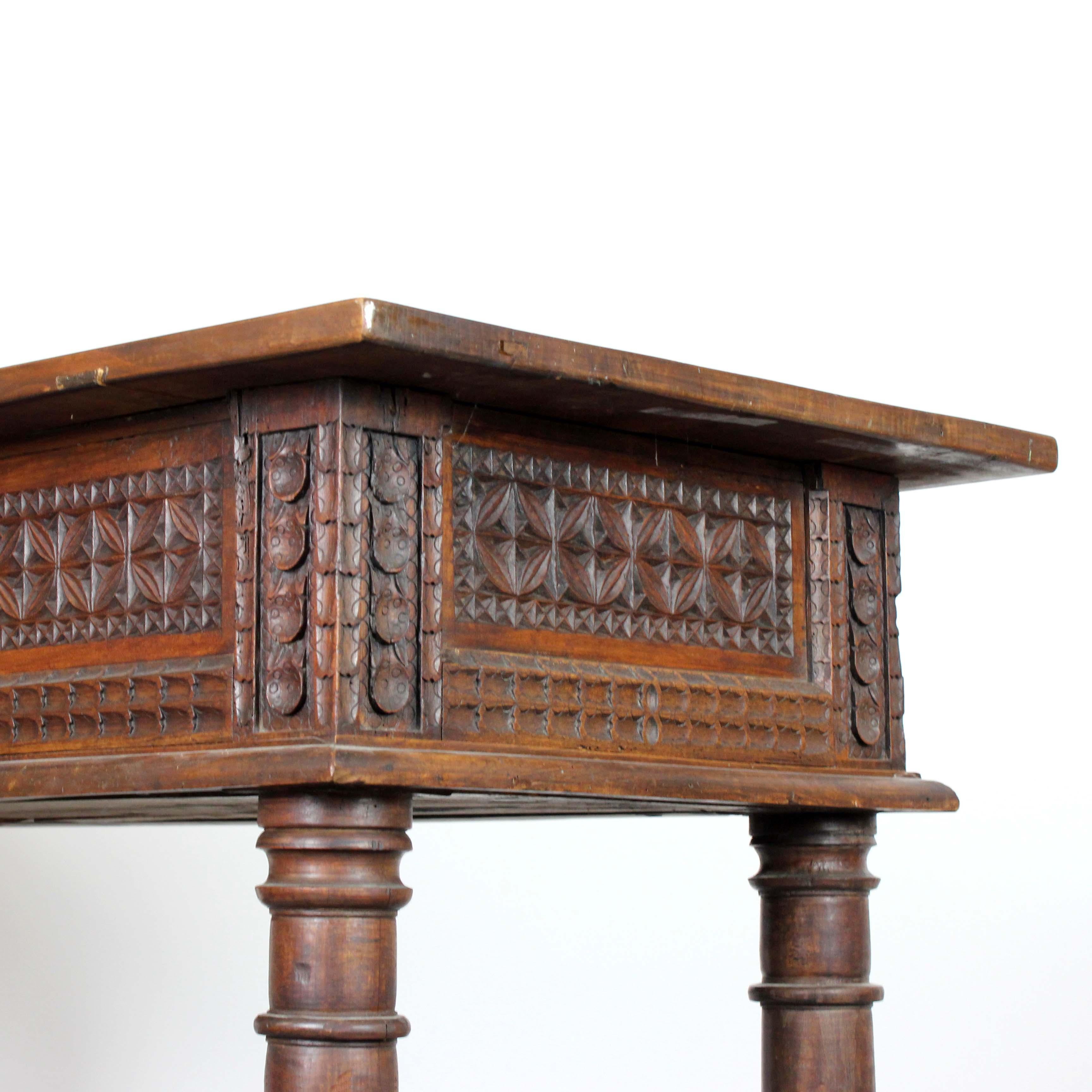 Walnut buffet table with turned legs and 