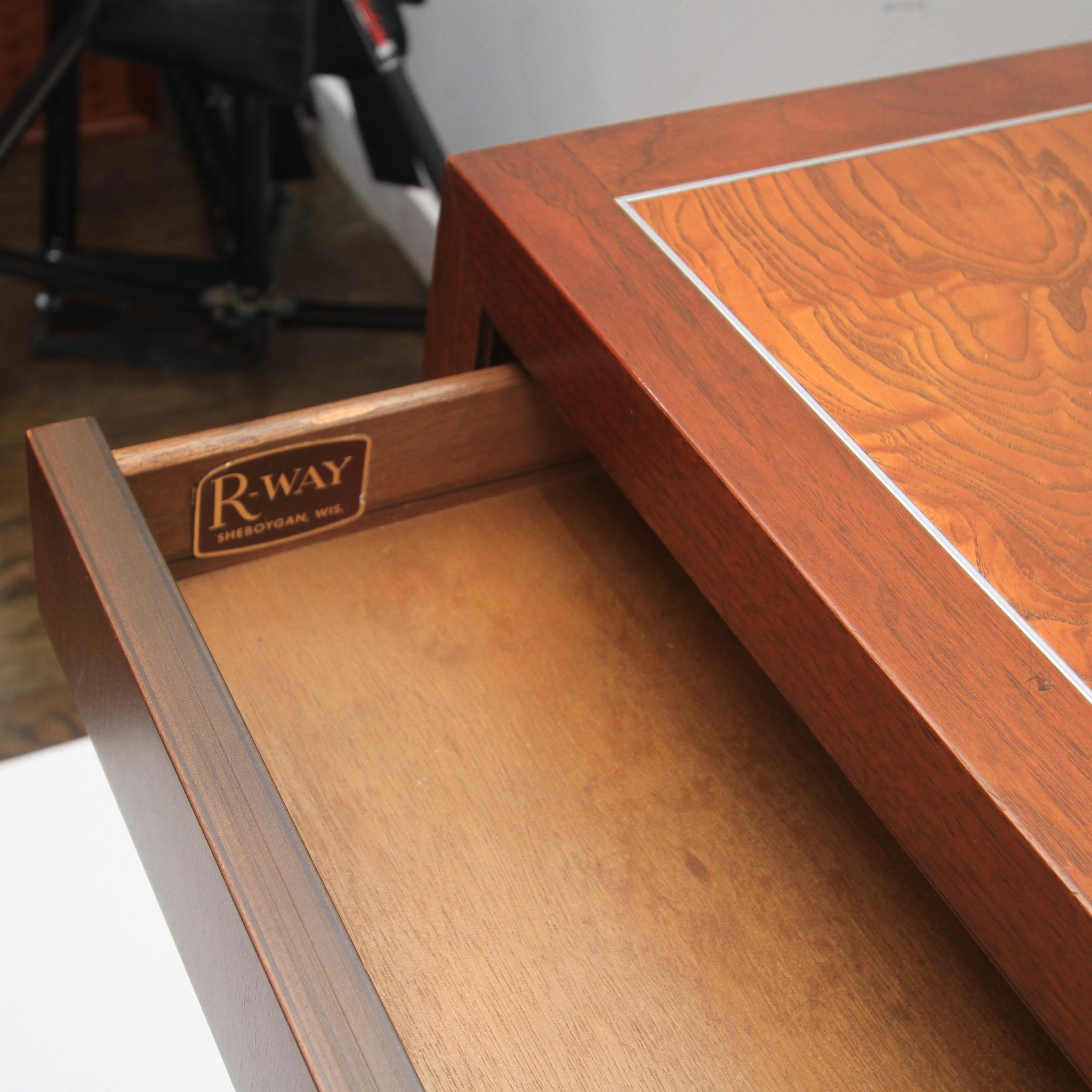 The clean, very well made office console or credenza is most likely the end of an era for R-way as they stopped production in the early 1990s. The six drawers are all dovetailed and feature soft close mechanisms. File drawer on bottom left. Two drop