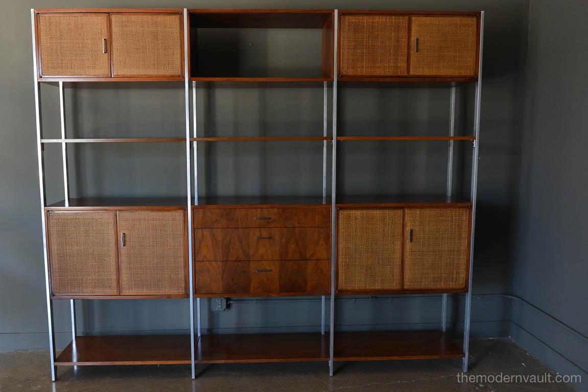 Walnut, cane and aluminum wall unit or room divider by Founders, circa 1970. A division of Knoll International, often attributed to Milo Baughman. Original unrestored condition is very good, only slight wear as shown. Self-adjusting easy glide feet,
