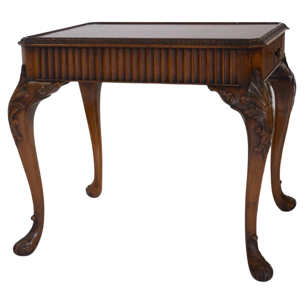 Walnut & carved coffee table with drawer