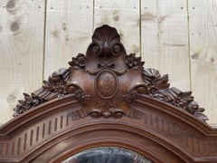 Espejo tallado en madera de nogal, estilo Napoleón III