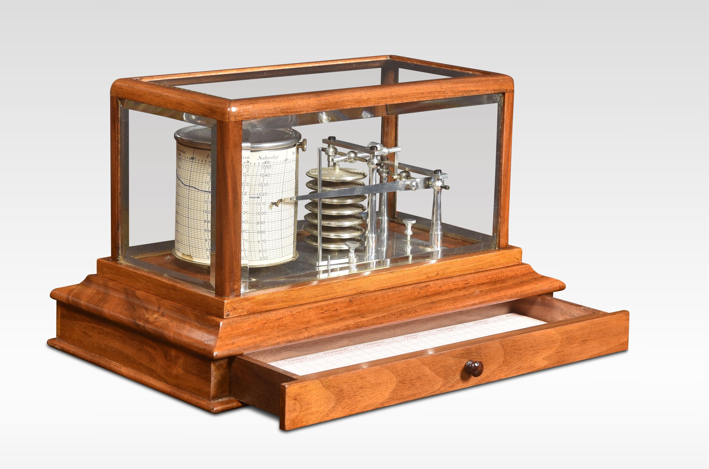 XJohn Trotter walnut-cased Barograph, having five beveled glazed removable lid, and a drawer below to house the charts. The mechanical eight-day movement is housed in the drum, fitted with a seven-day chart that covers one full rotation of the drum.