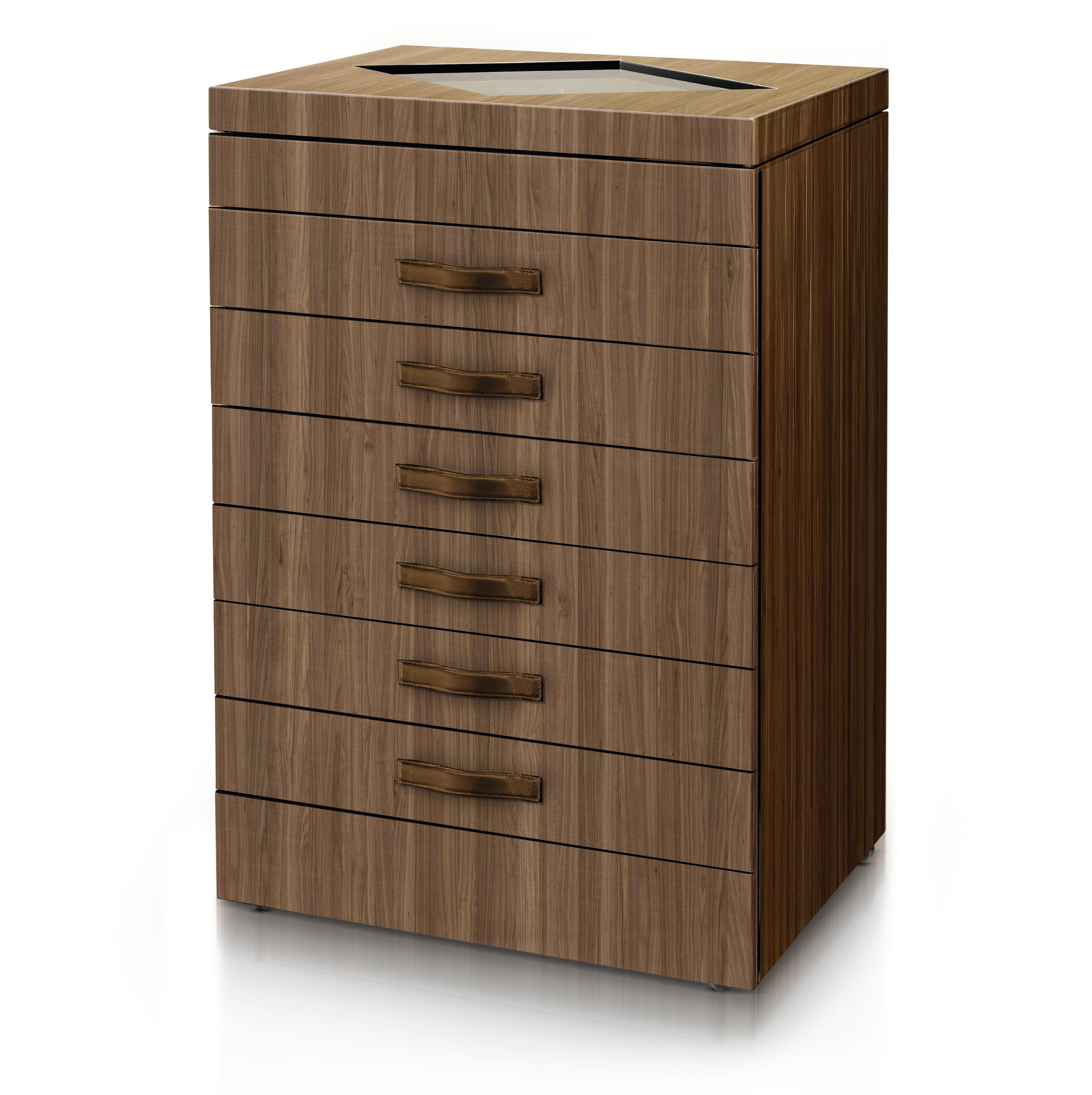 Multigame chest in matte Canaletto walnut with brown leather handles. It contains roulette, rake, Roulette/Craps/Bridge carpets, chips, chess, chessboard, backgammon, mahjong, poker, dice, leather cups, dominoes, and cards.