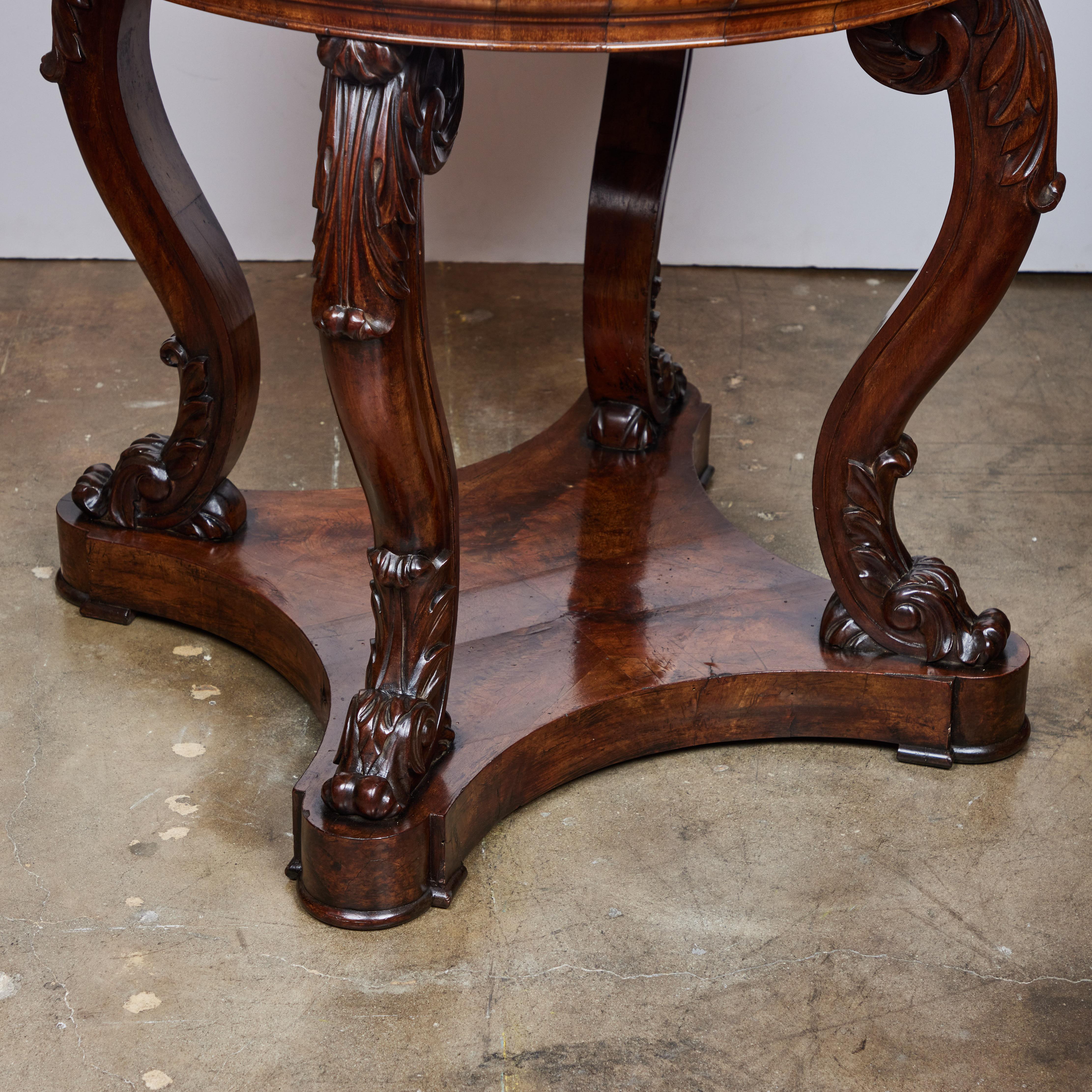 Hand-Carved Walnut Round Center Table with Inset Lapis Top For Sale