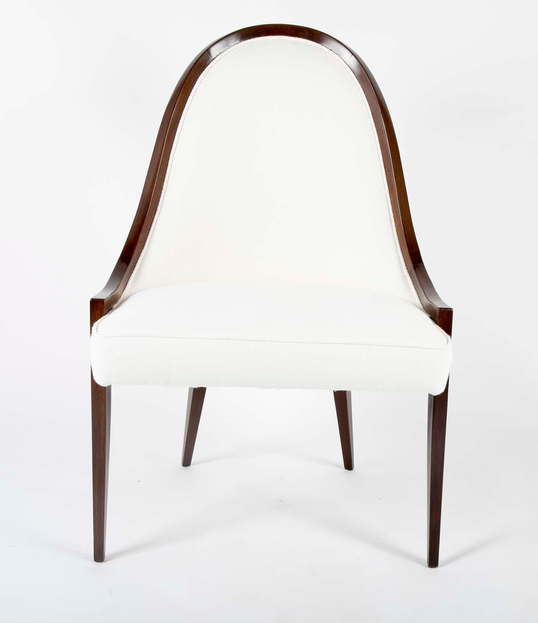 Walnut chair designed by Harvey Probber. Newly upholstered.
Measures: Seat height 18.5