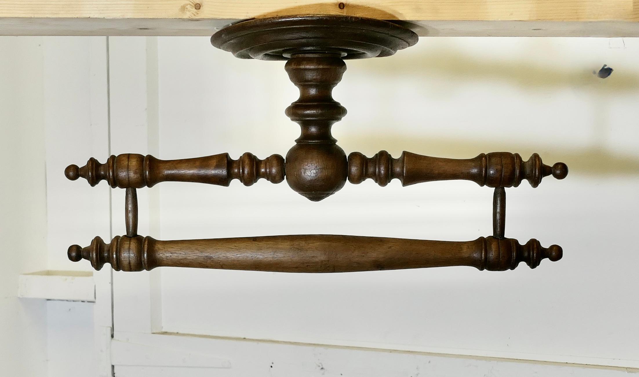  Walnut Ciel de Lit or Bed Canopy Curtain Frame

A lovely and well used piece, this French Curtain Rail is turned from Walnut, it has a circular ceiling fitting supporting the curtain bracket
One of the more straight forward to use and very
