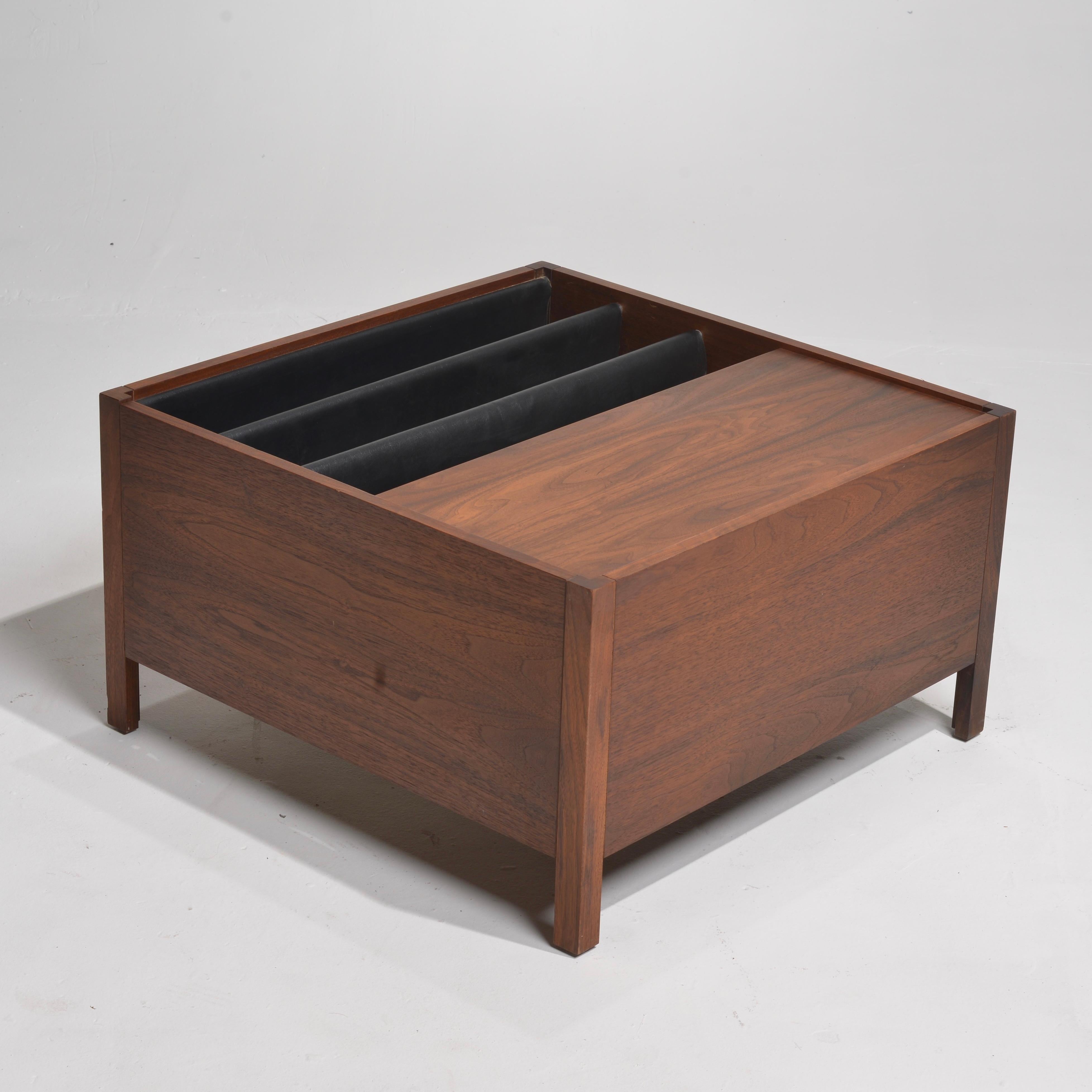Gorgeous square walnut table in the Mid-Century Modern style with compartment featuring soft black leather dividers for books, magazines, or records. The storage compartment measures 12 inches deep and is separated into three sections.