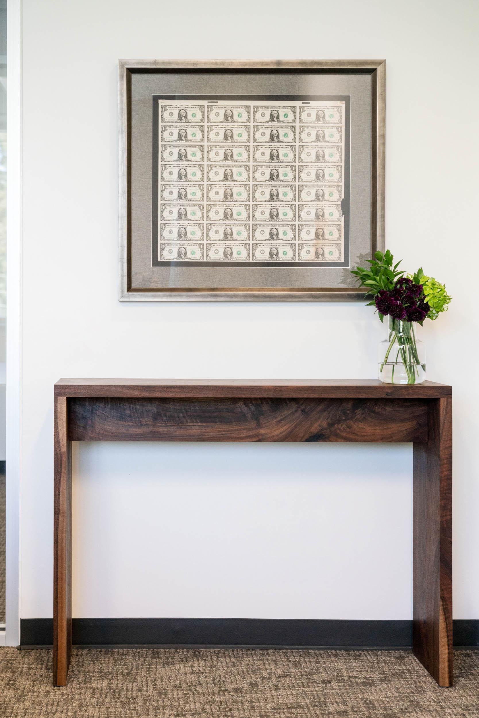 The Spider table is a narrow wood console table, rustic yet refined with traditional box joints, handcrafted with solid Alabama urban hardwood. The table is made to order and can be custom sized for use in a foyer, hallway or as an end table.