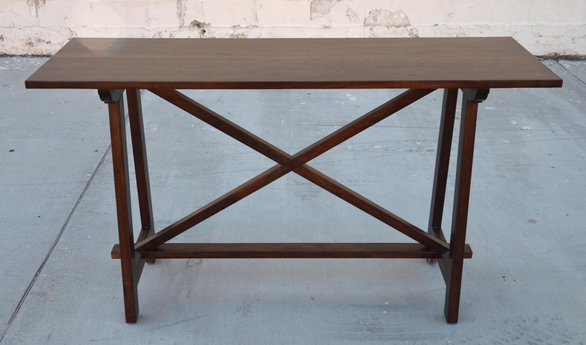 This walnut console table is seen here in 60