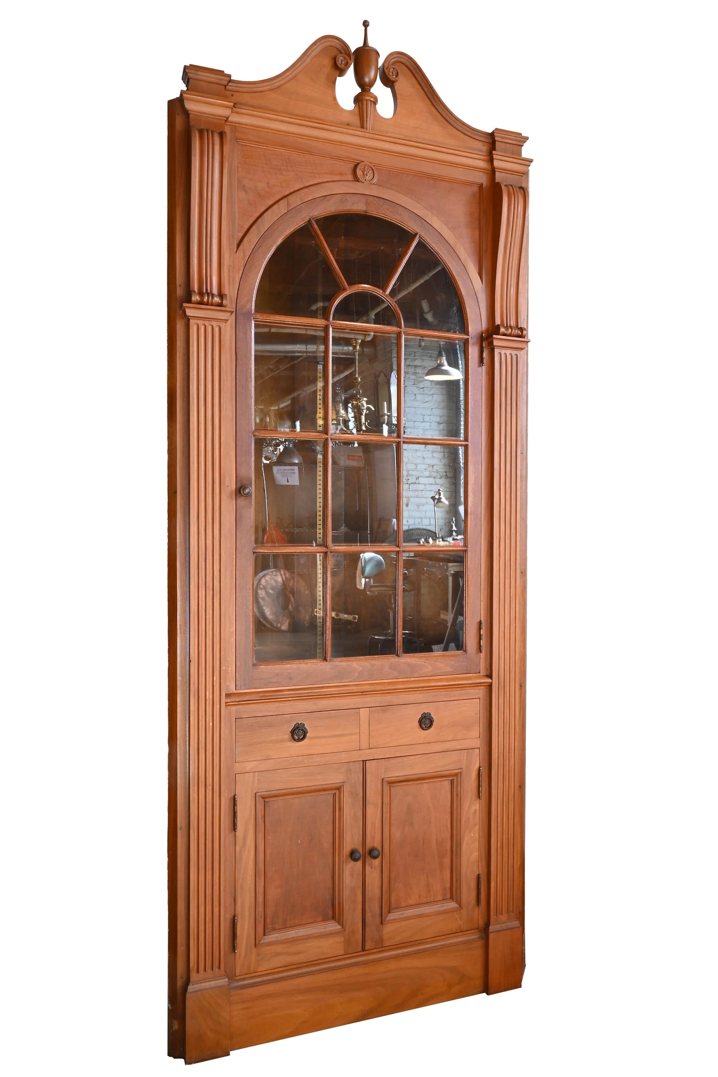 A pair available, priced separately.

This matching pair of solid walnut corner cabinets with their hand carved detailing along with a walnut mantel and others pieces like rounded room dividers, paneled doors, etc. all salvaged by our team from a