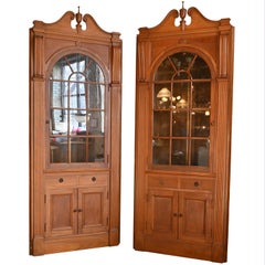 Used Walnut Corner Cabinet with Arched Window and Urn Finial