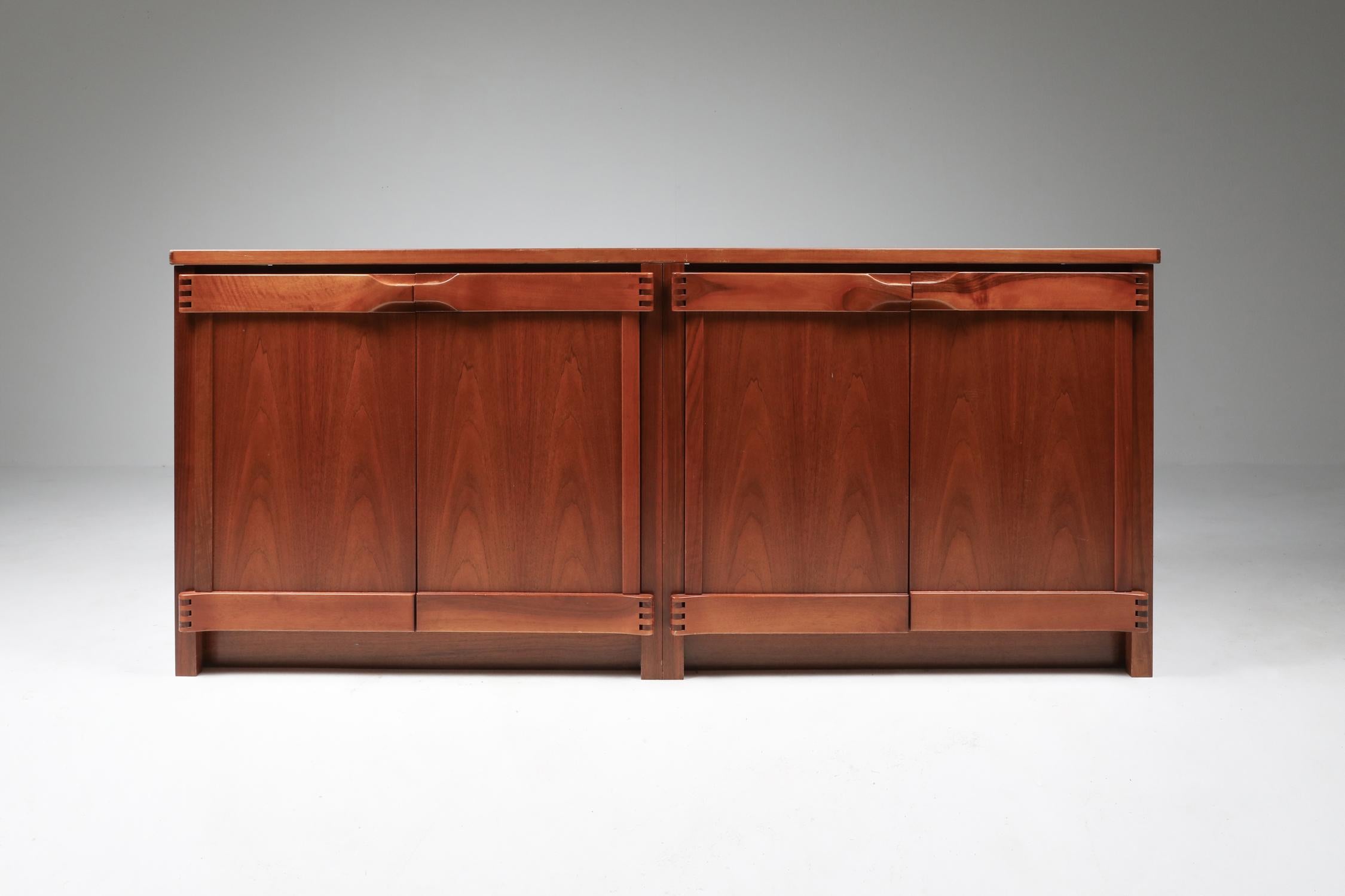 Pierre Chapo style sideboard in walnut by Franz Xaver Sproll, 1960s.
Fantastic use of hinges and connections just as Pierre Chapo did in the same era.
    

