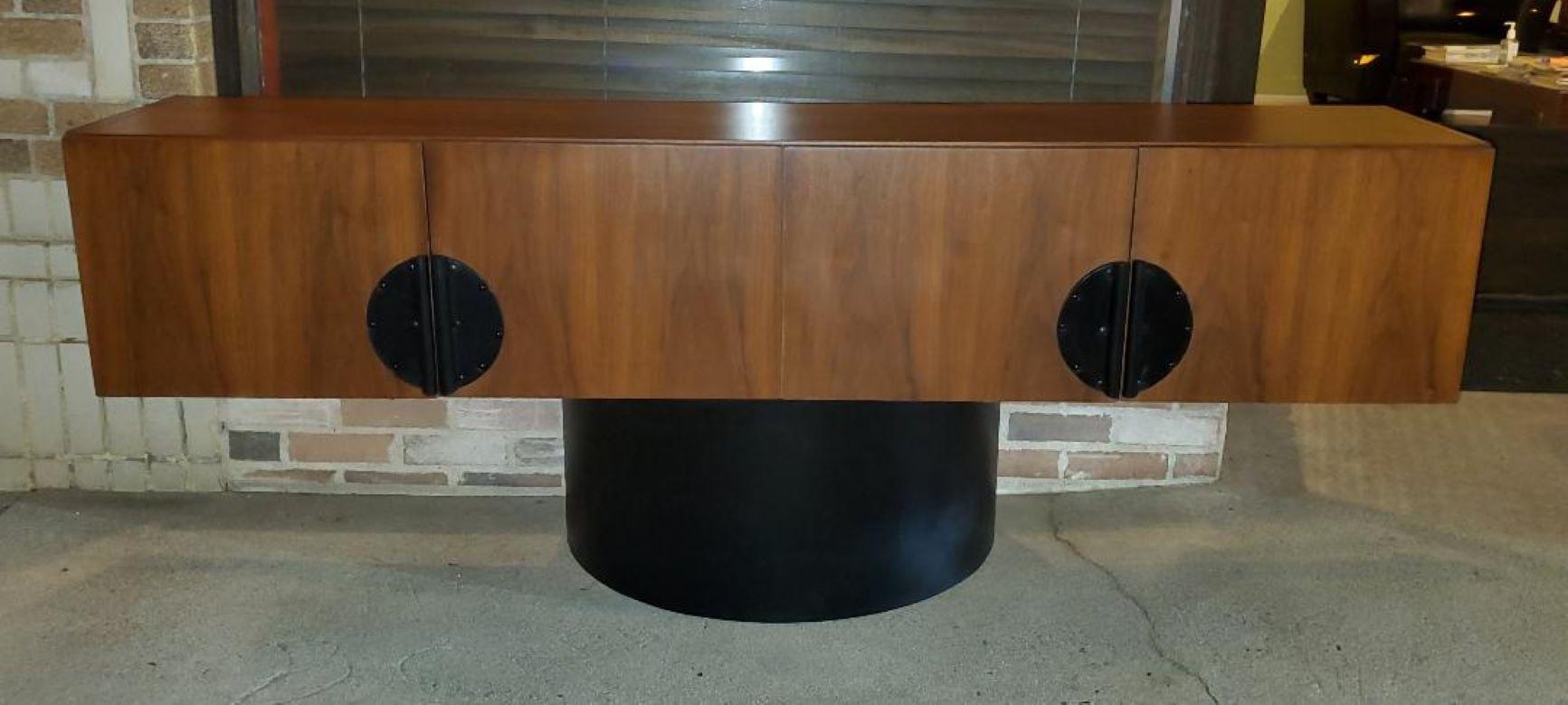 Walnut Credenza By Steelcase Has A Beautiful Walnut Cabinet With Black Circular Leather Pulls And A Black Half Moon Base.
This Steelcase Walnut Cabinet Is Amazing Because It Will Also Store Your Prized Collection Of Vintage Albums / Records. 
The