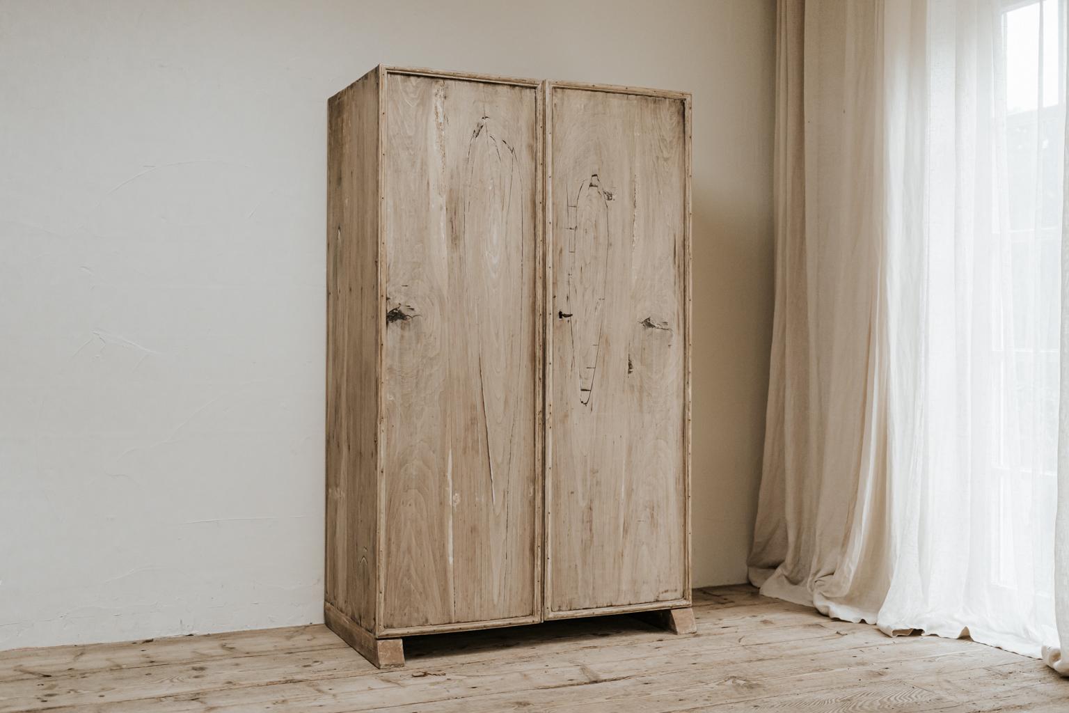 This cupboard was created in my workshop, made out of antique walnut, pure lines, a unique piece.