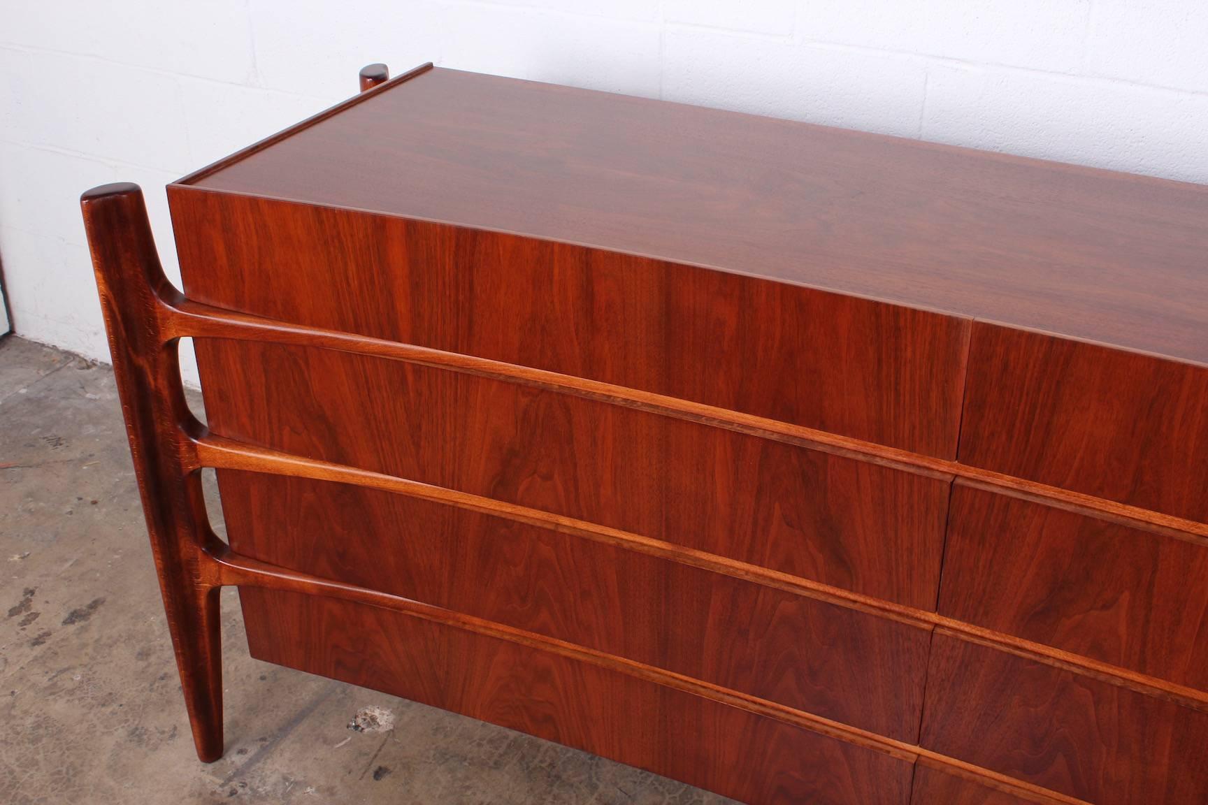 Walnut Curved Front Dresser Designed by William Hinn 1