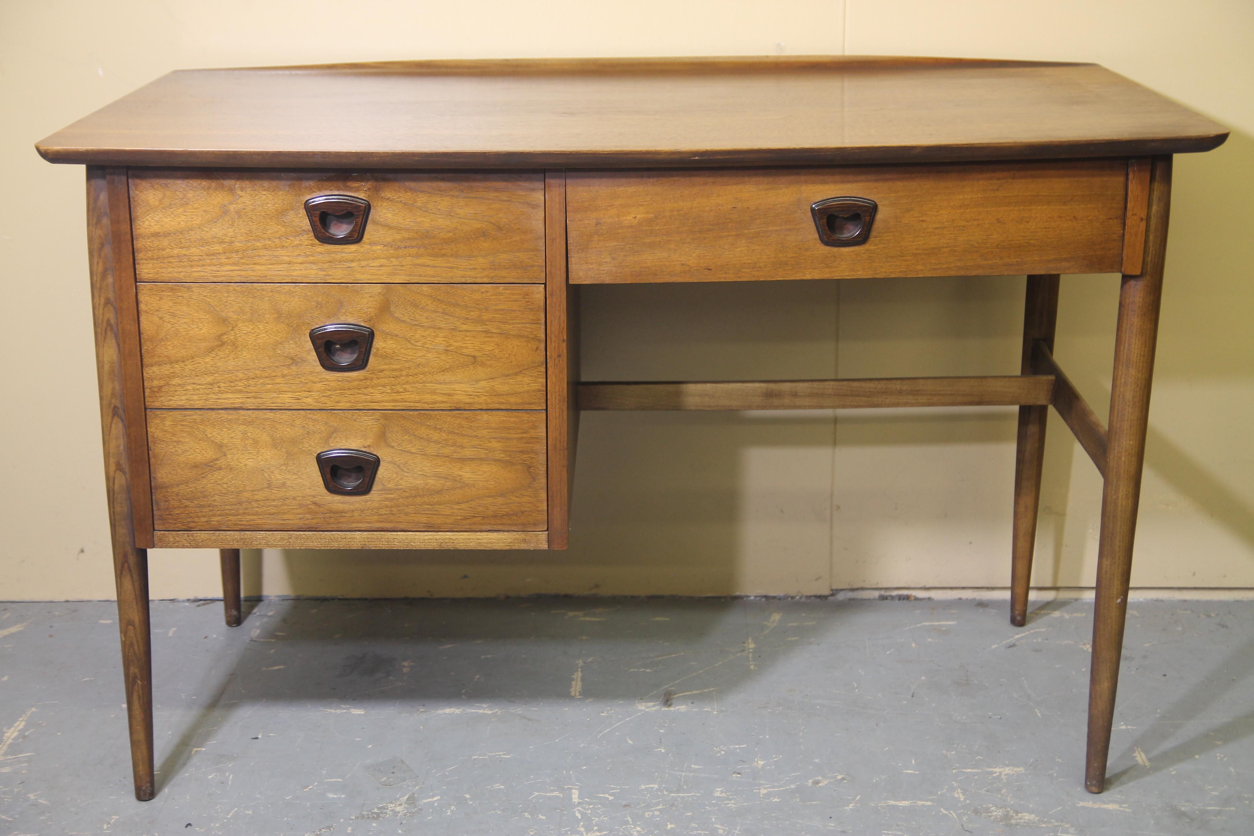 Nice 1960s walnut desk by the Basset Furniture Co. was purchased from the original owner.