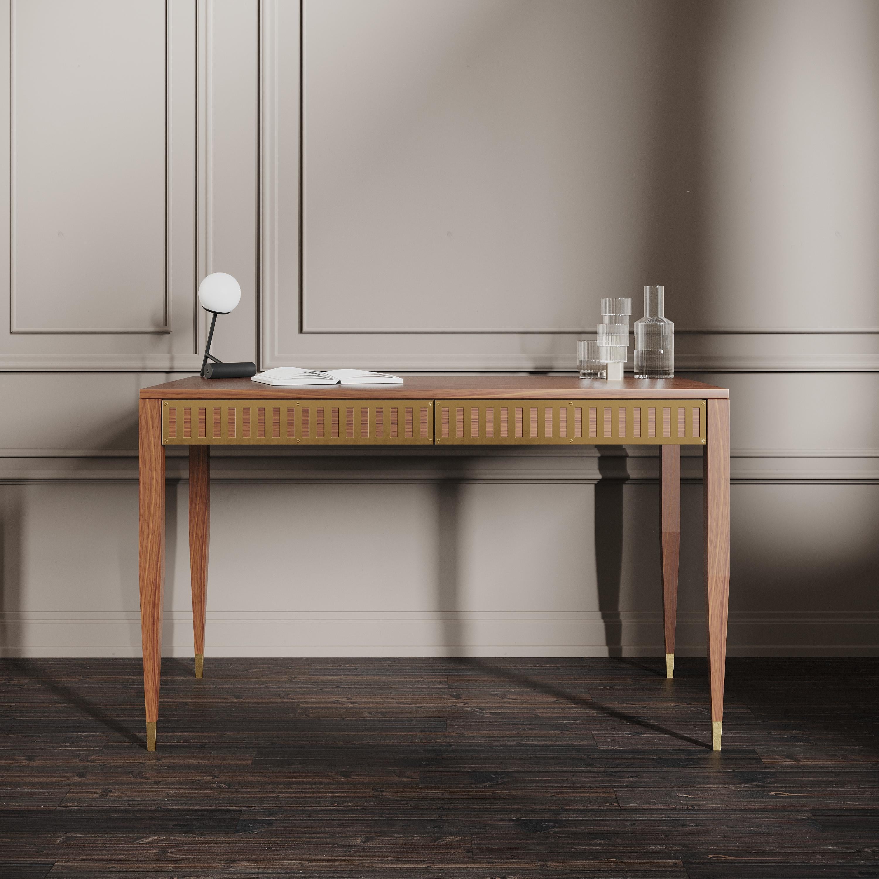 Desk in mid-century style with two drawers with brass fronts. The tapered legs are finished with brass plated aluminum feet. Desk made of solid American walnut wood and wood covered with natural American walnut veneer. Other wood on request. Perfect