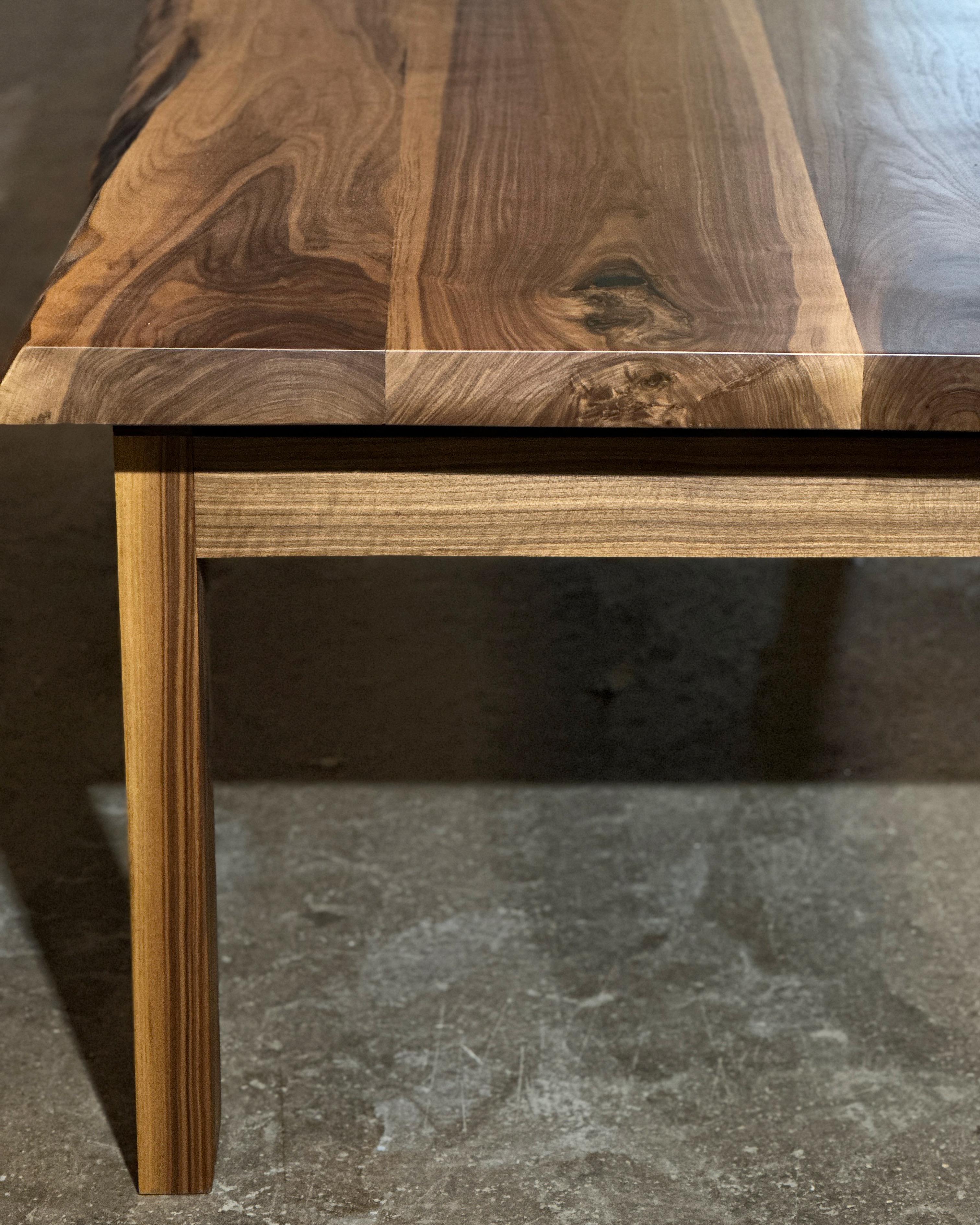 American Walnut live edge / waney edge dining table with matching American Walnut base. 
Professional, hardwearing spray finish, hardware integrated to allow ease of assembly and disassembly. 

Price is for 2400mm L x 1000mm W. 
All sizes, finishes