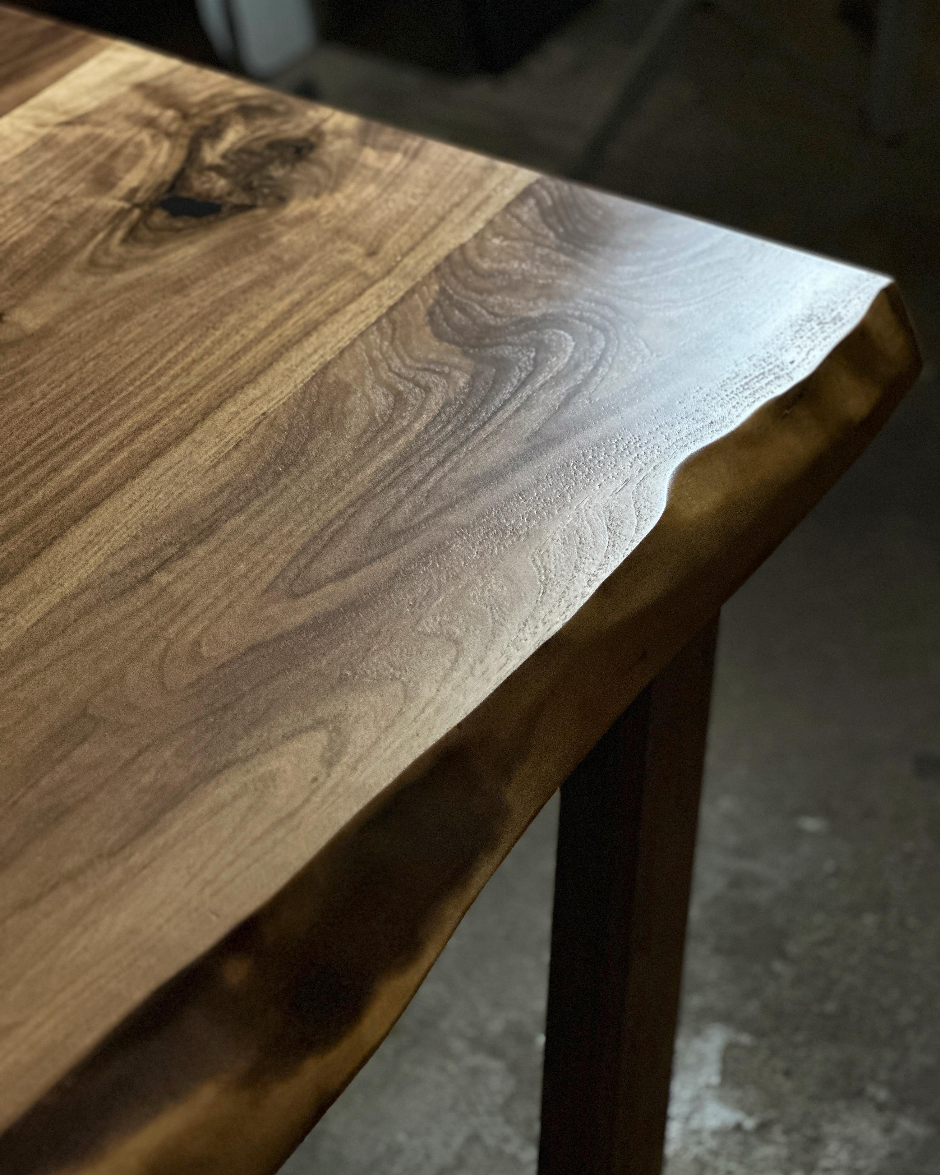 British Walnut waney edge dining table For Sale
