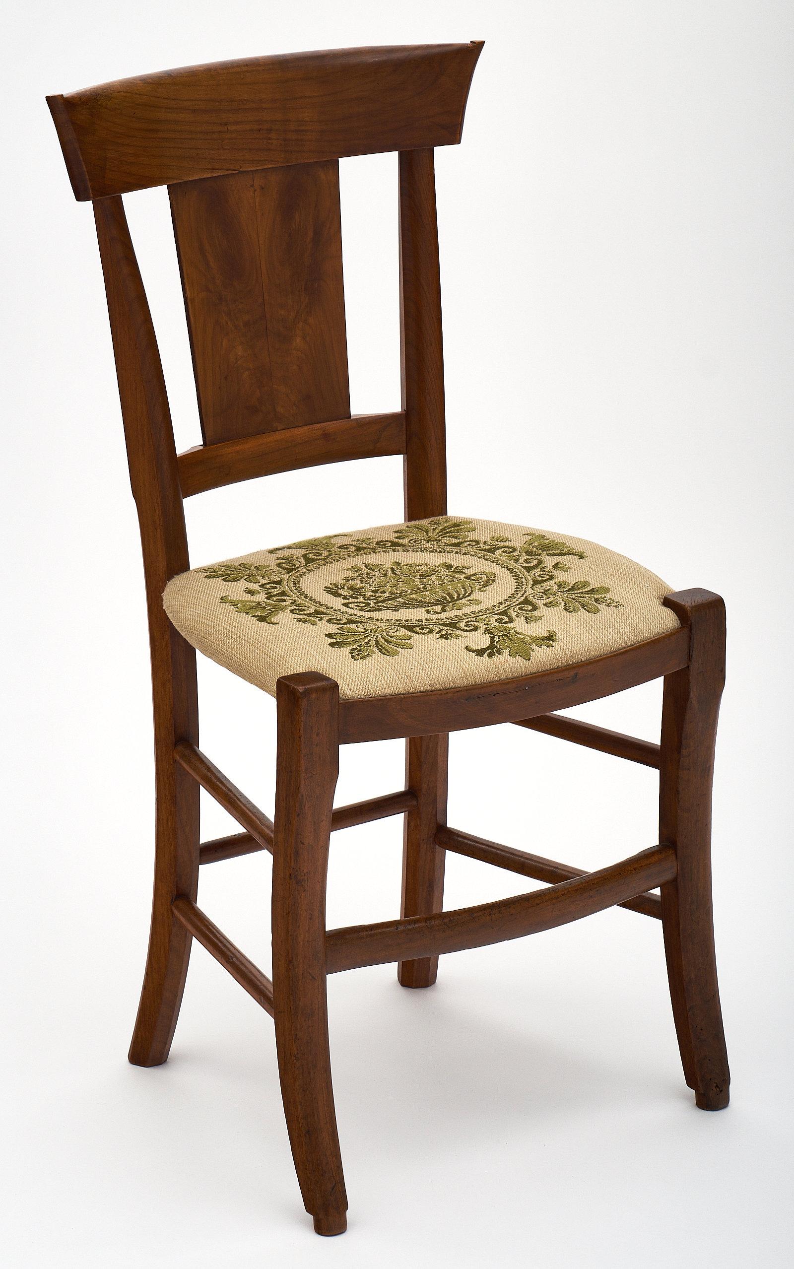 A set of six Directoire period walnut dining chairs with beautiful classic lines and a seat covered with 