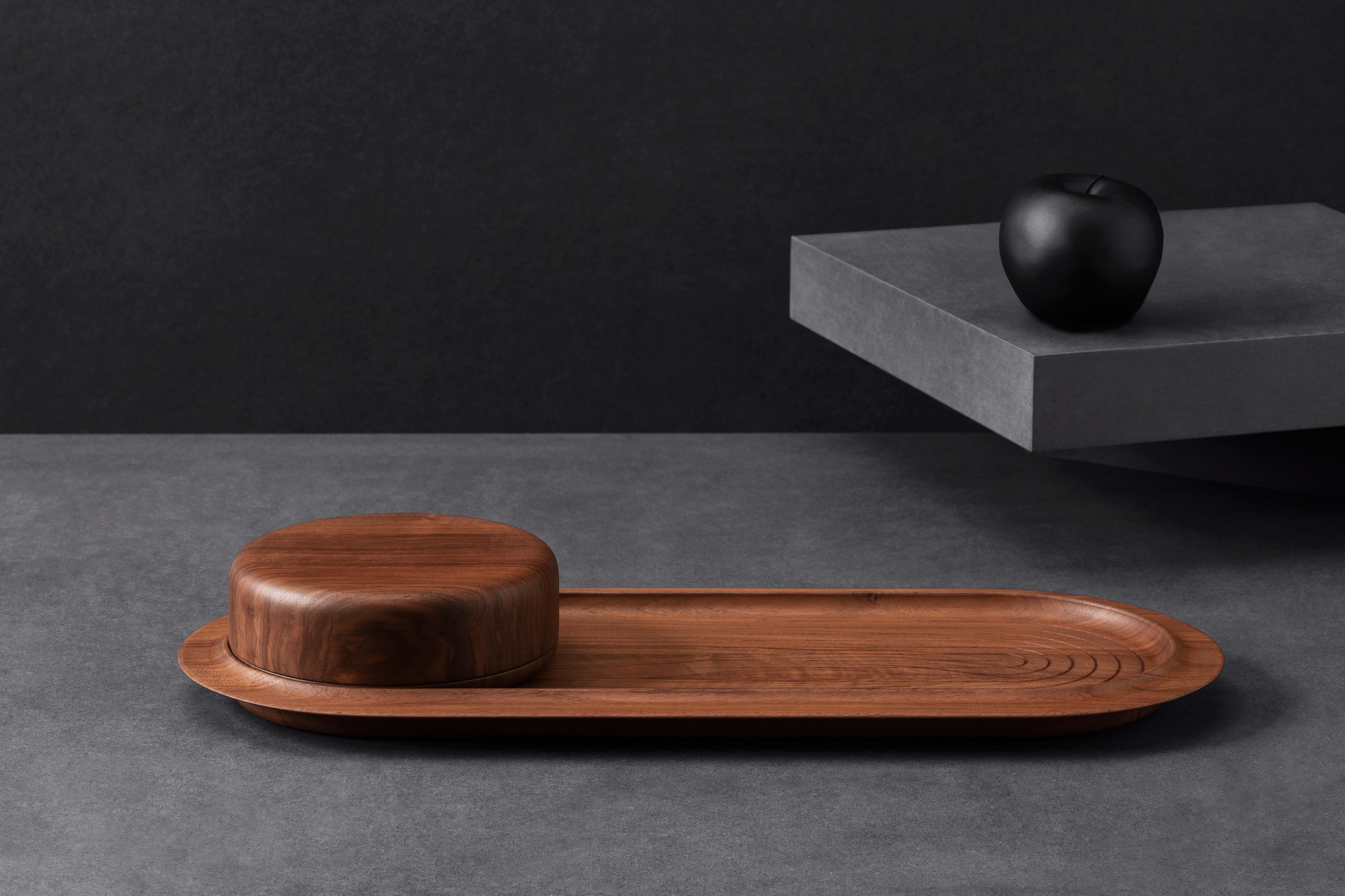 Walnut Do-Ri tray by Matthias Scherzinger
Dimensions: L 47.4 x W 19.8 x H 6.5 cm
Materials: Europe walnut lacquered
 inside tin: hard wax

Also available in olive ash and Europe walnut.

It all began in Glottertal, Germany. Born in 1978,