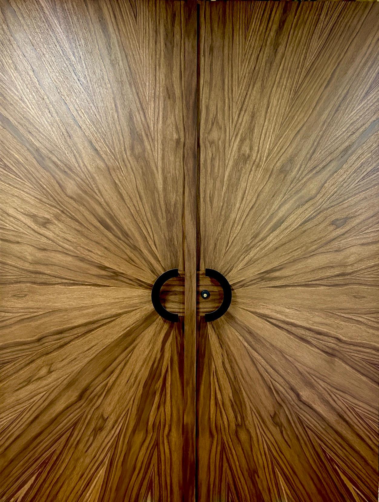 Model radial sunburst walnut.
Made to order by History Never Repeats LLC. Designed by Aaron Saxton & Maria Armada. Custom produced double doors. As shown 103