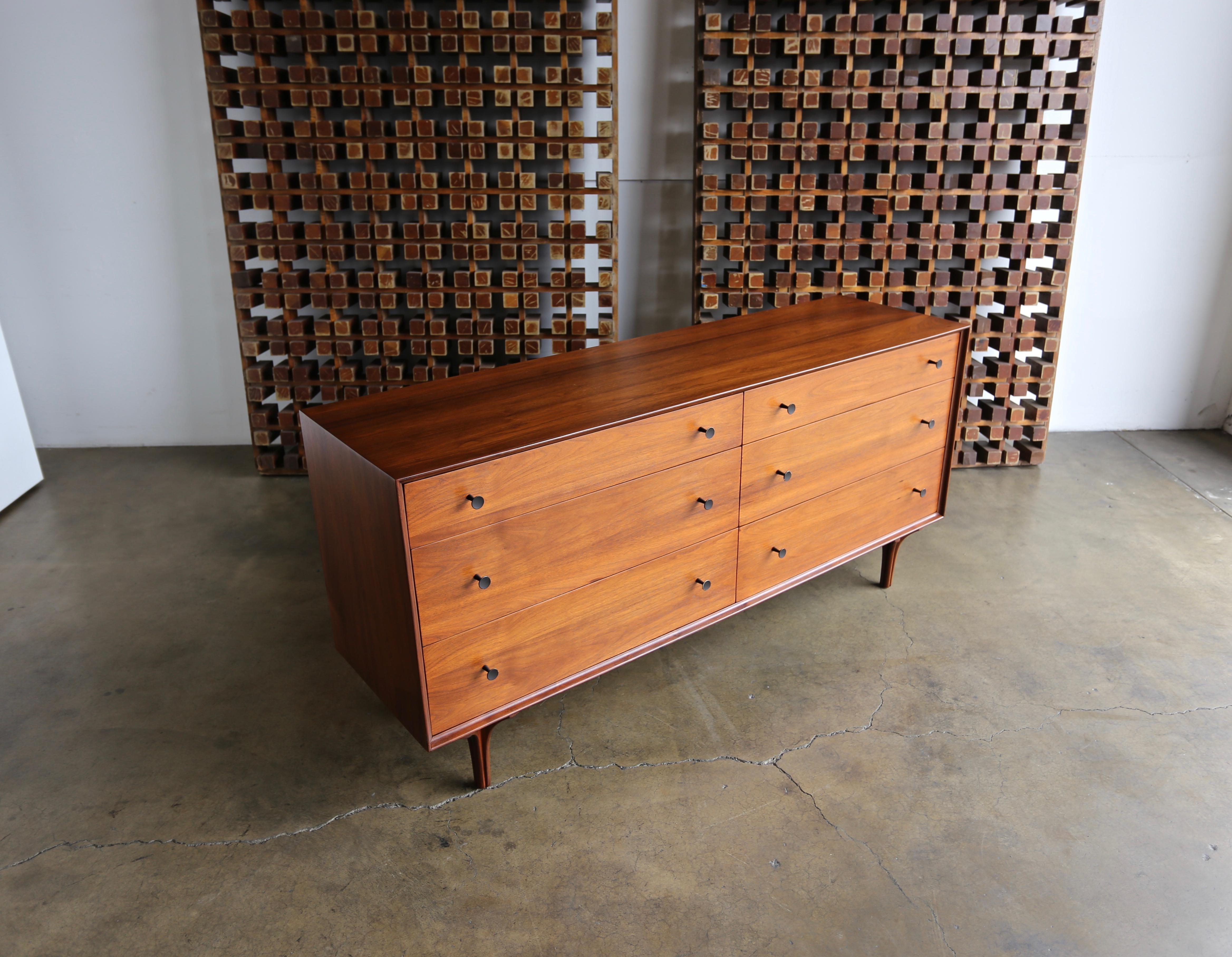 Walnut dresser by Robert Baron aka Craig Nealy for Glenn of California. This piece has been professionally restored.