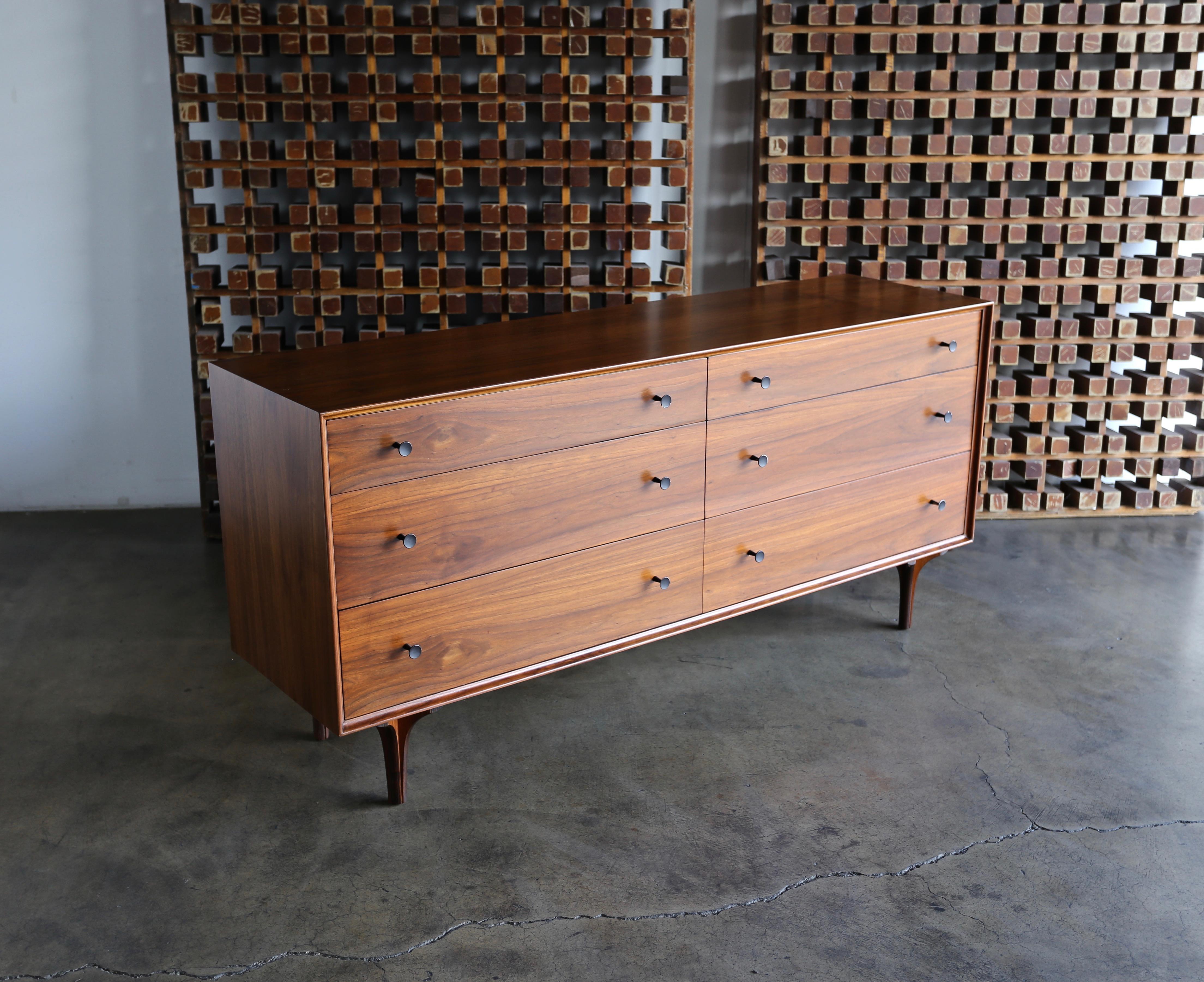 Walnut dresser by Robert Baron aka Craig Nealy for Glenn of California. This piece has been professionally restored.