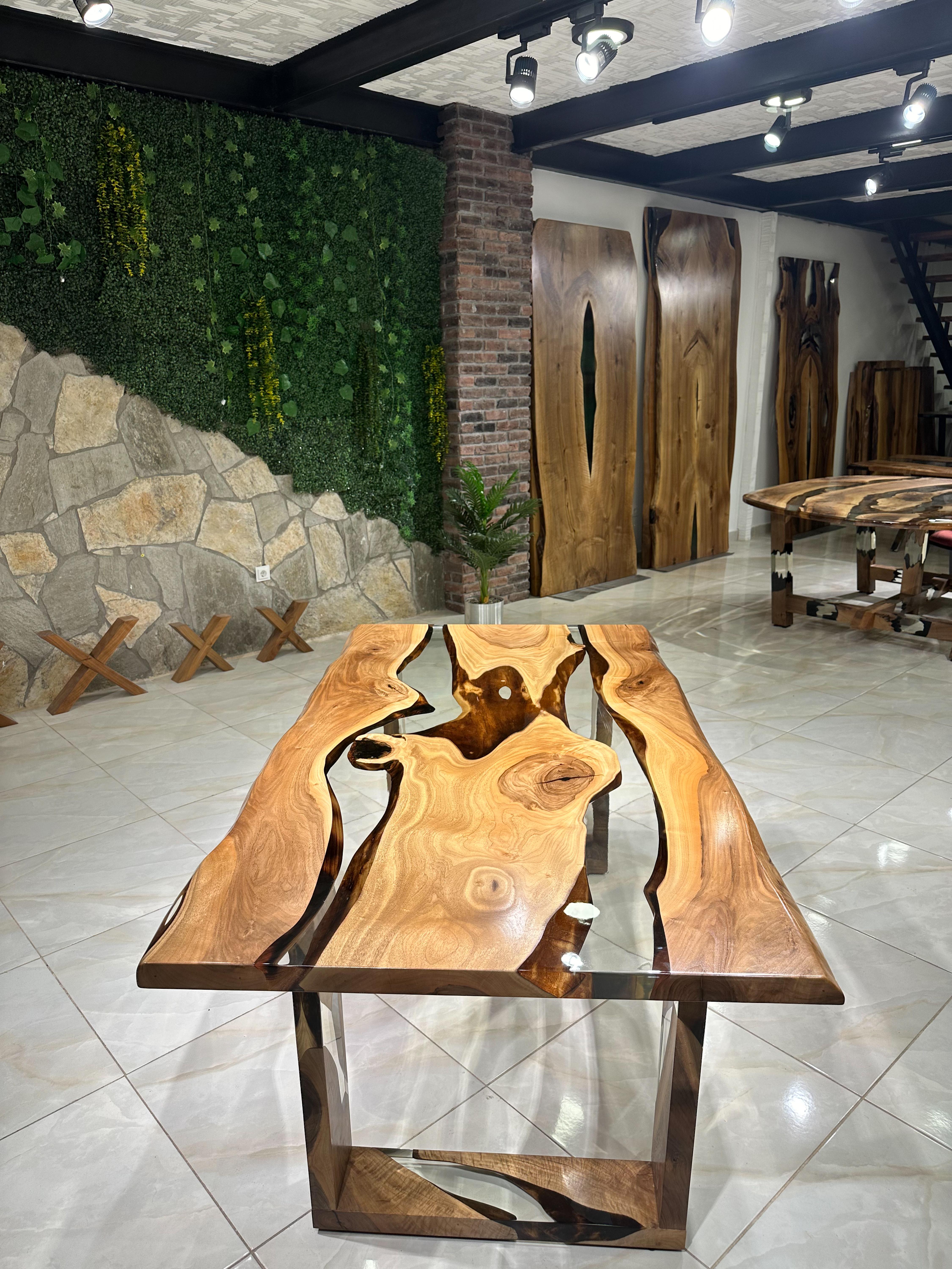 Custom Epoxy Resin Dining Table 

This table is made of 500 years old Walnut Wood. The grains and texture of the wood describe what a natural walnut woods looks like.
It can be used as a dining table or as a conference table. Suitable for indoor