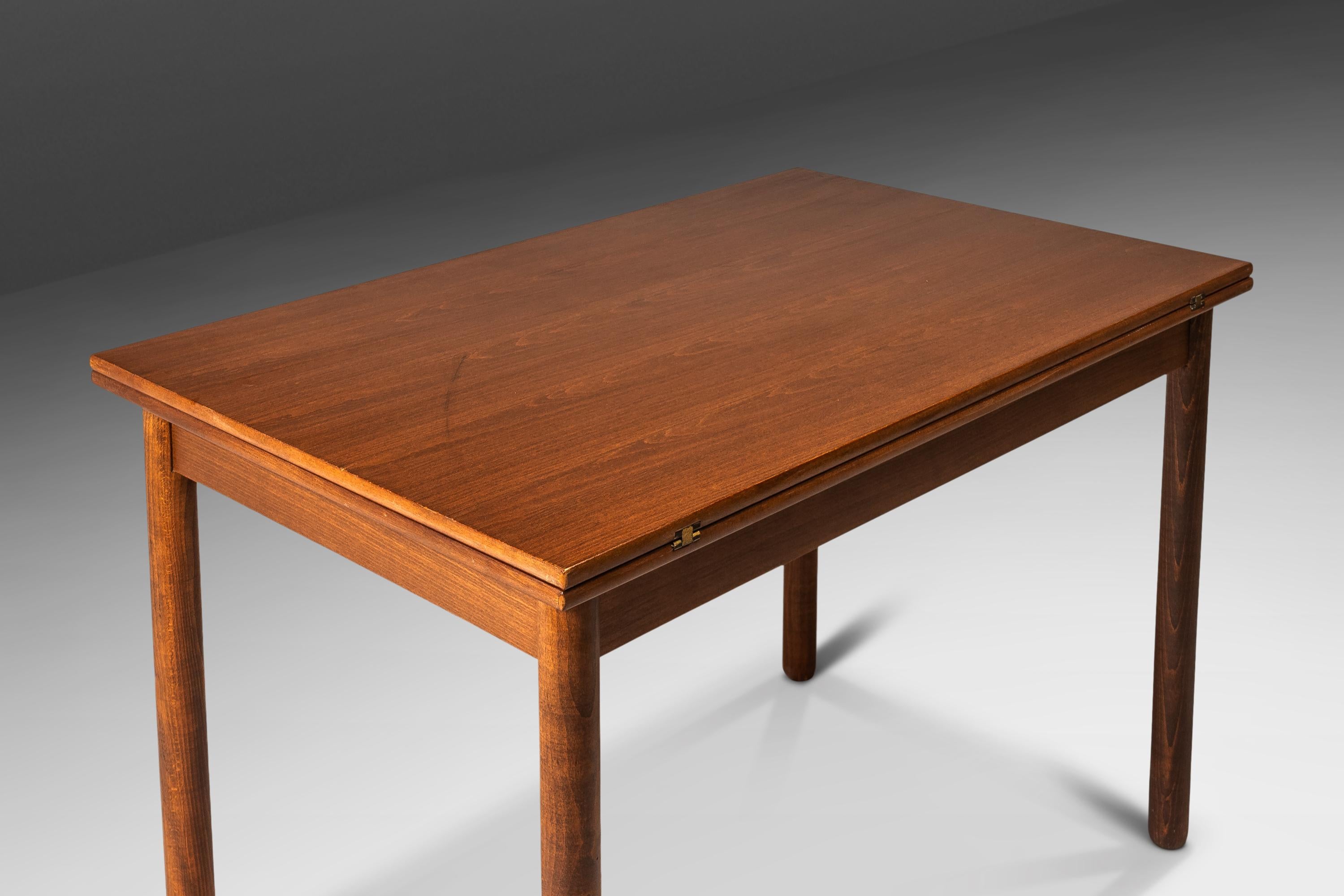 Mid-20th Century Walnut Extension Flip-Flap Dining Table, Folke Ohlsson Style, USA, c. 1960's For Sale