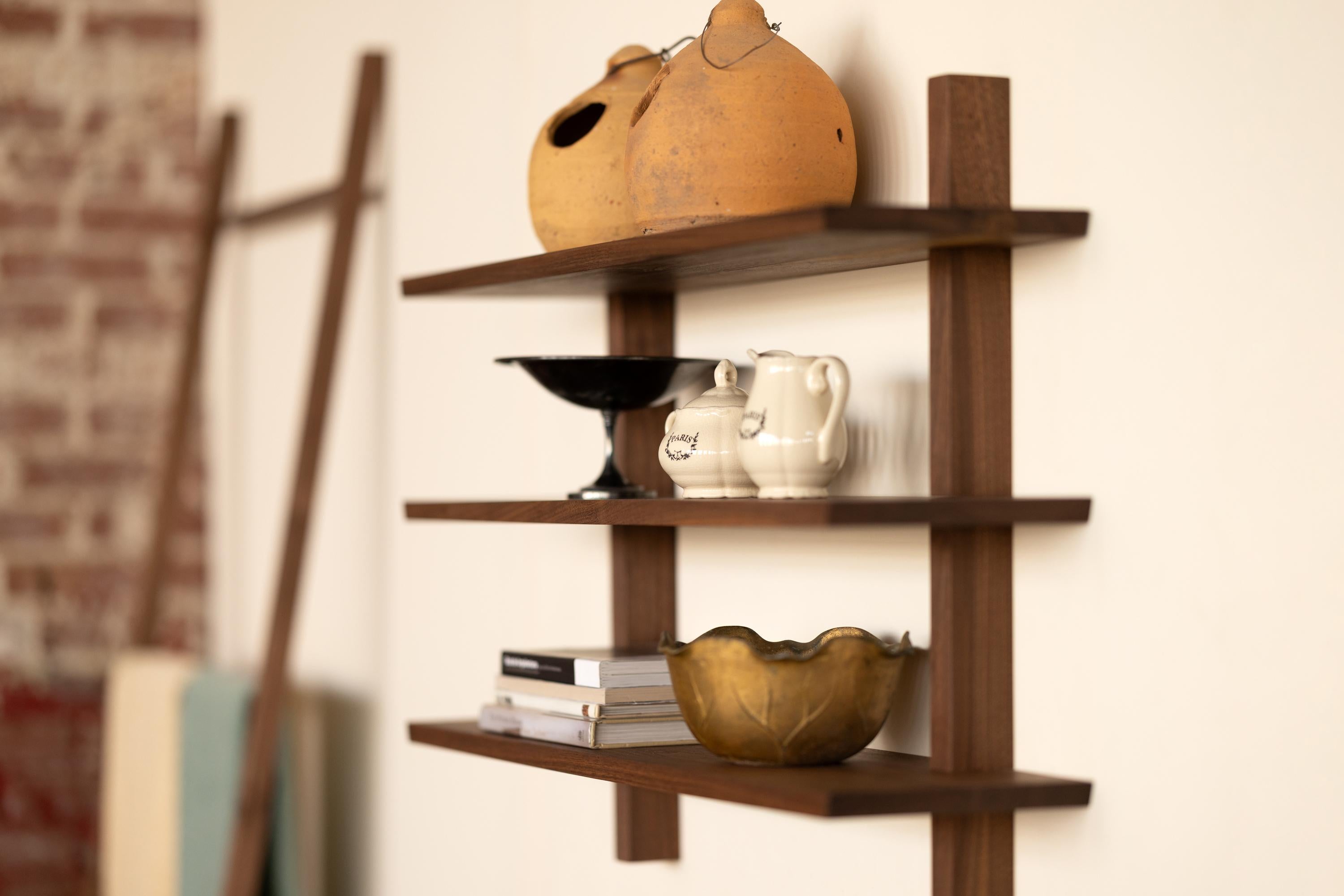 This Floating Shelving Unit offers a new and modern take on Mid-century wall storage. Defined by sturdiness and minimalism, this Still Life floating shelving unit is available in natural walnut or stained oak. 

What is now called a 