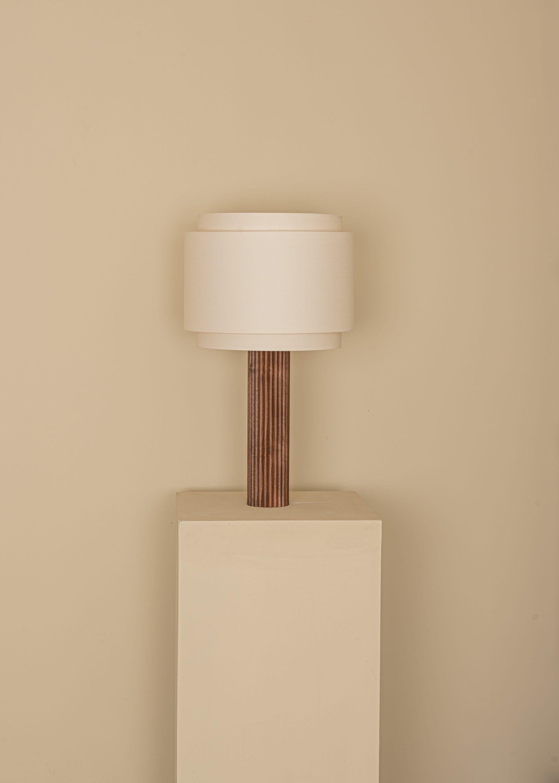 Walnut Fluta Duoble Table Lamp by Simone & Marcel
Dimensions: D 35 x W 35 x H 60 cm.
Materials: Cotton and walnut.

Also available in different marble and wood options and finishes. Custom options available on request. Please contact us. 

All our